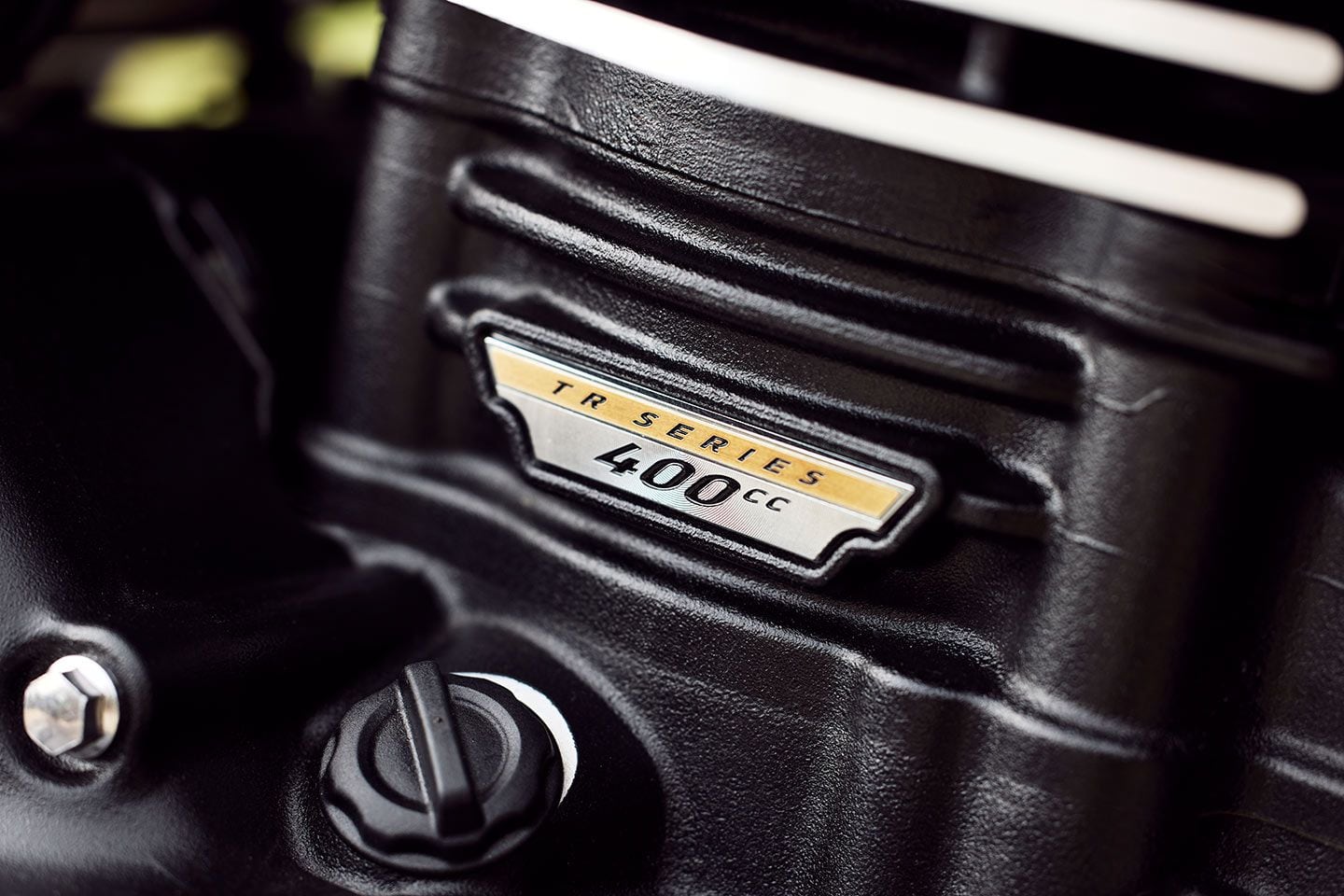 A 398cc TR-series single puts out a claimed 39.5 hp at 8,000 rpm.