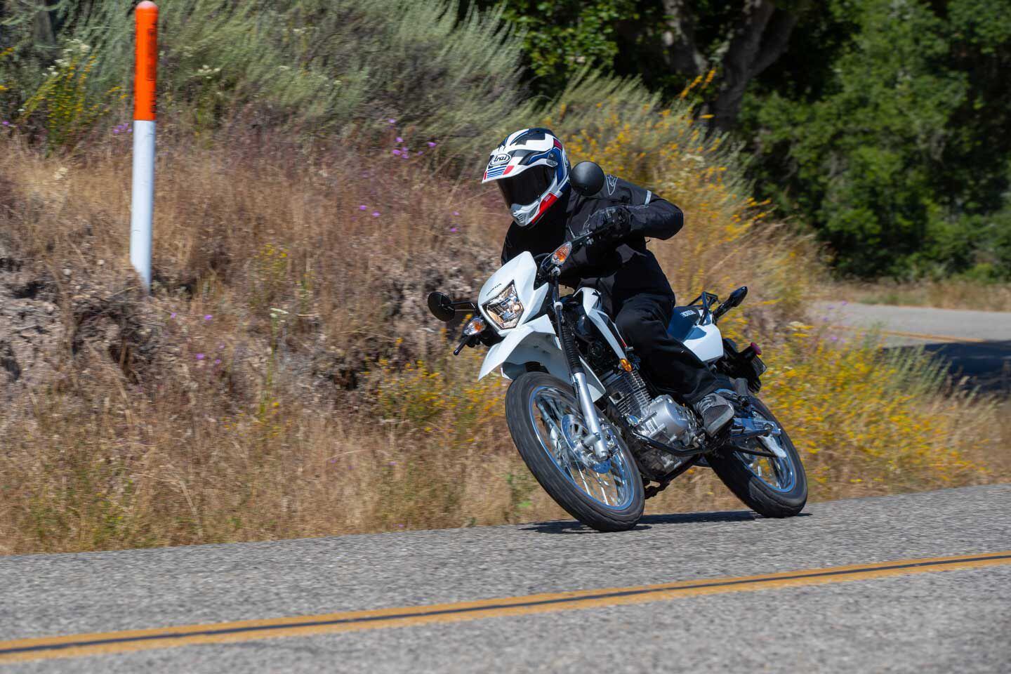 When it’s time to get out of town, the 2023 Honda XR150L holds its own on a canyon road.