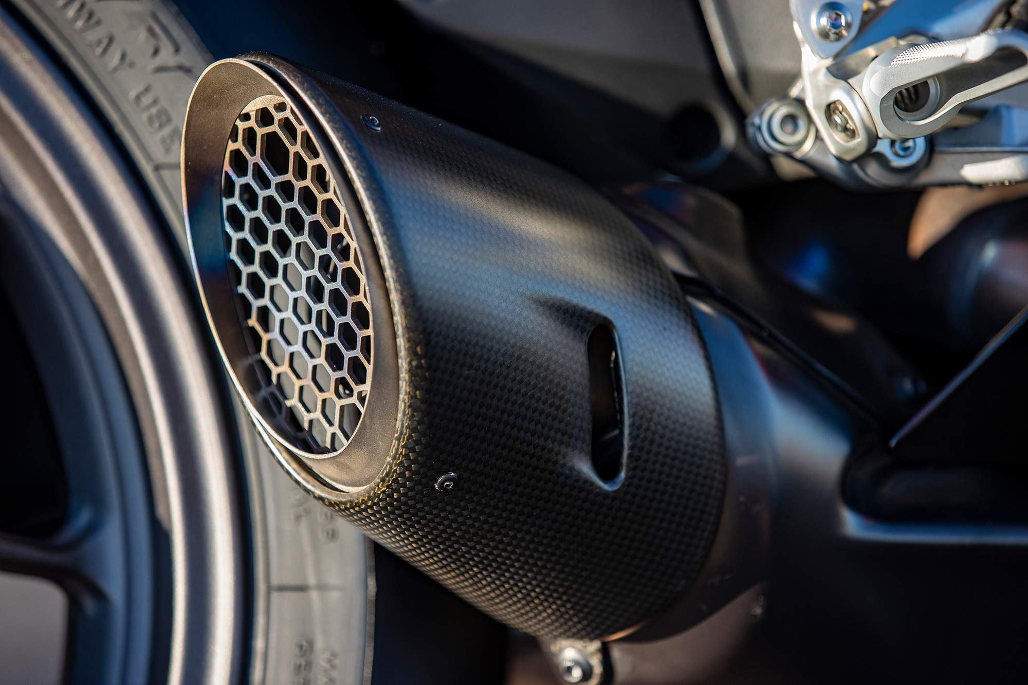 After passing through a labyrinth of stainless steel and a pair of catalytic converters, a beautiful sound emerges from the single silencer.