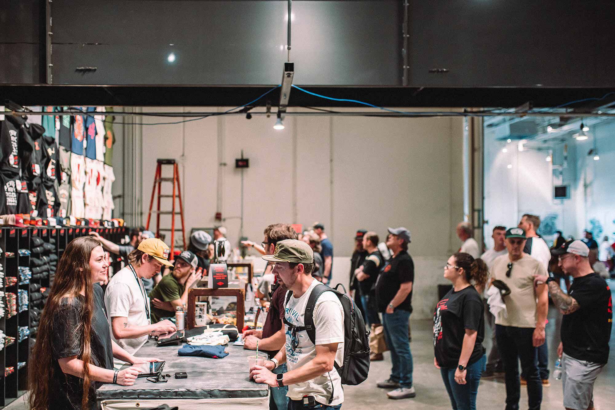 Attendees lining up to get some limited Handbuilt Moto Show merchandise.