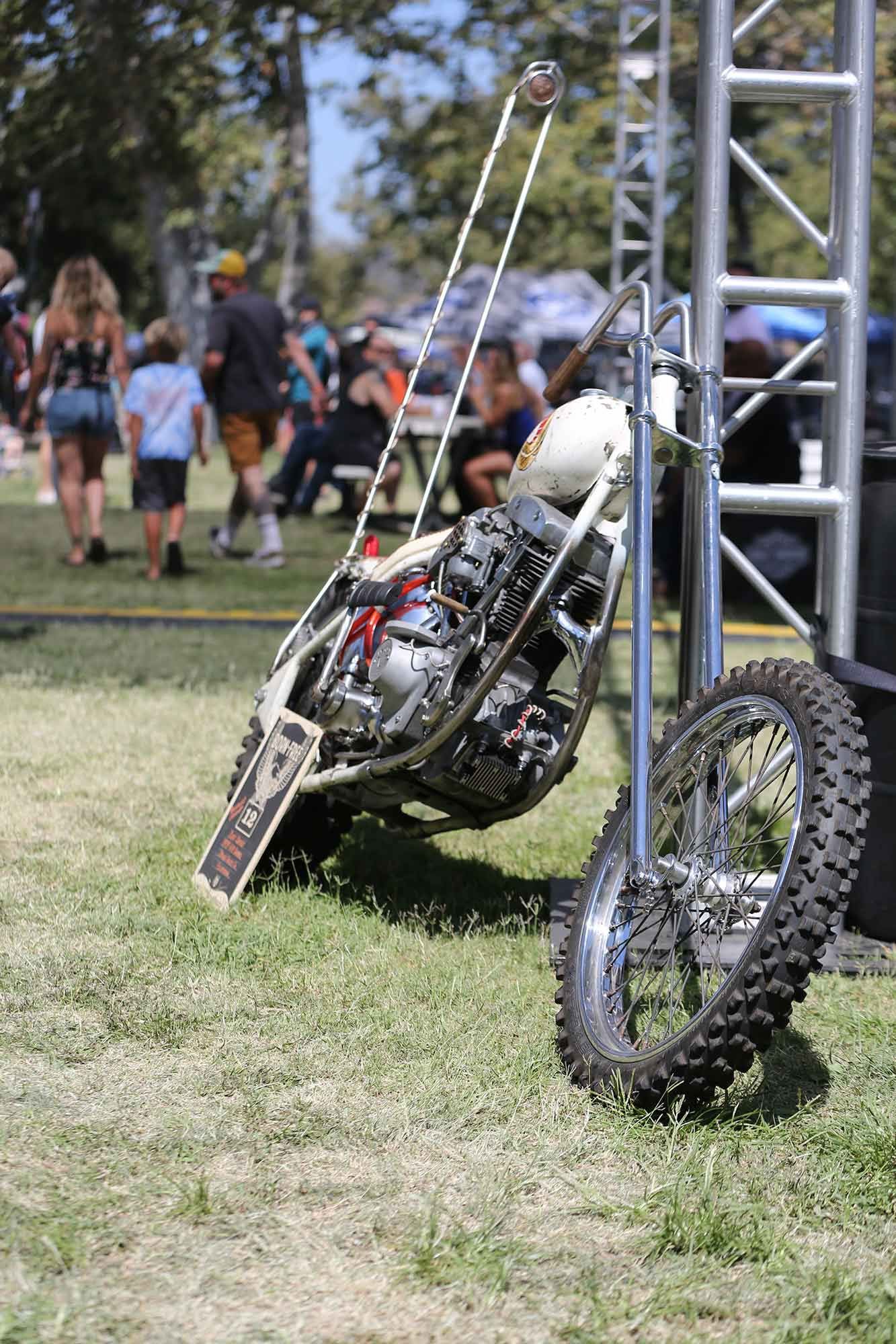 Setting out to build the dumbest chopper of all time, Cliff Cavins also managed to win Biltwell People’s Champ! Notice that front exhaust pipe that goes straight into the frame…