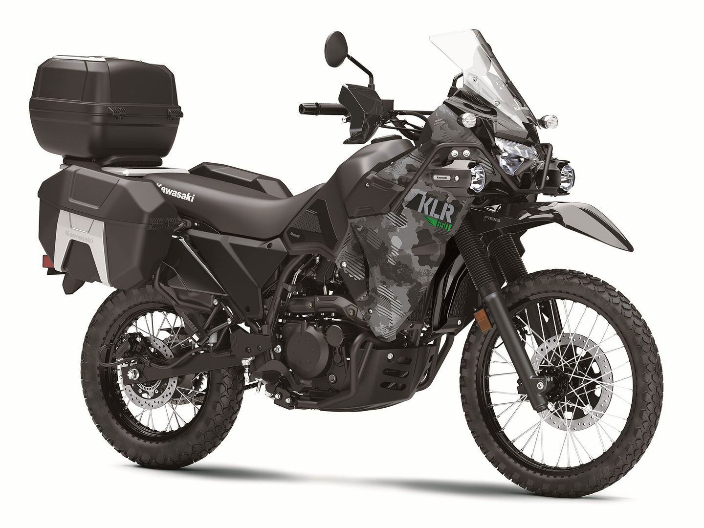 The 2022 KLR650 Adventurer (shown in Cypher Camo Gray) comes with side cases, fog lamps, frame sliders, and more. The top case is standard on the KLR650 Traveler model.