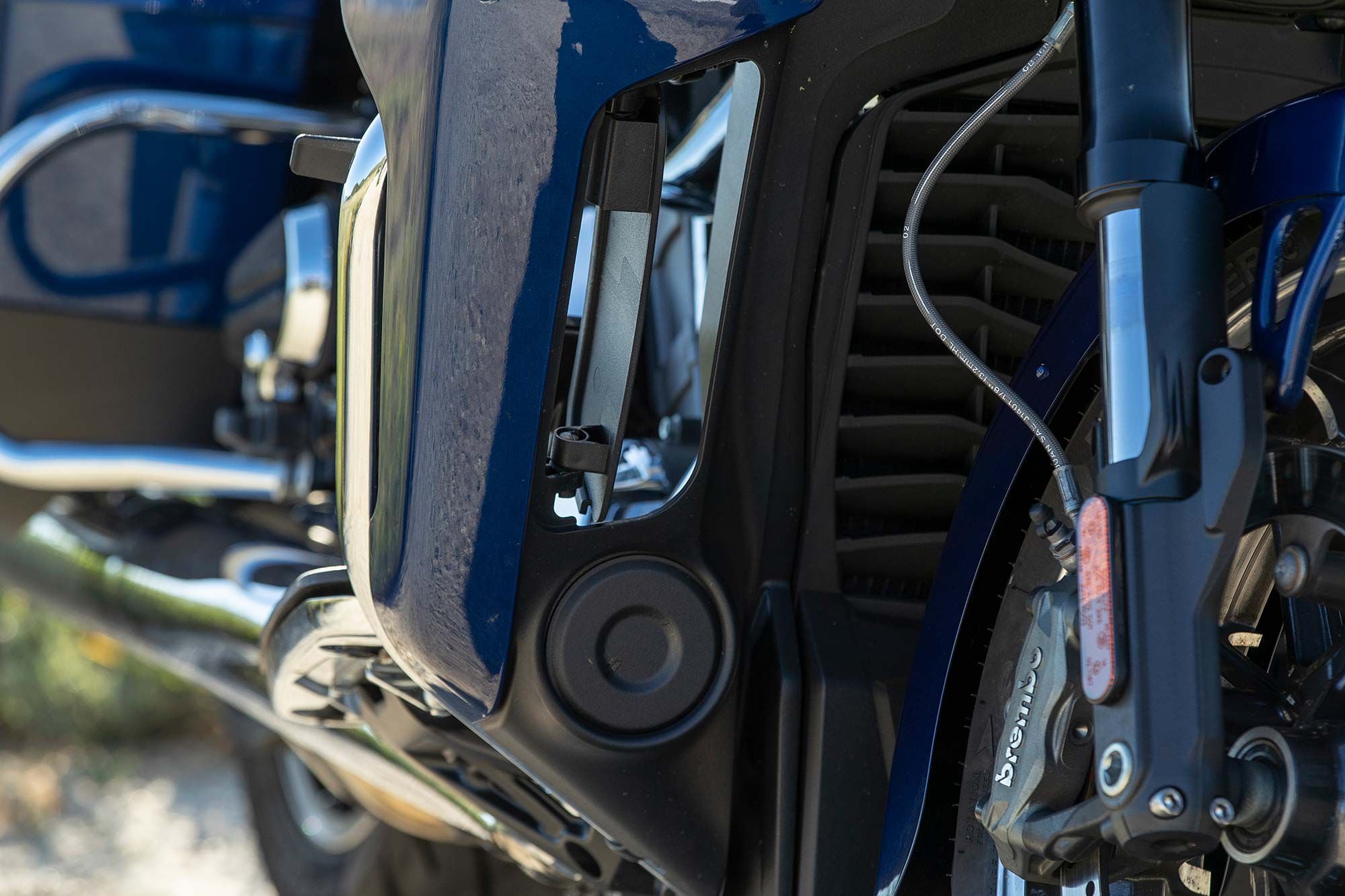 Vents on the Pursuit’s lower fairing help to cool both the engine and the rider’s leg.