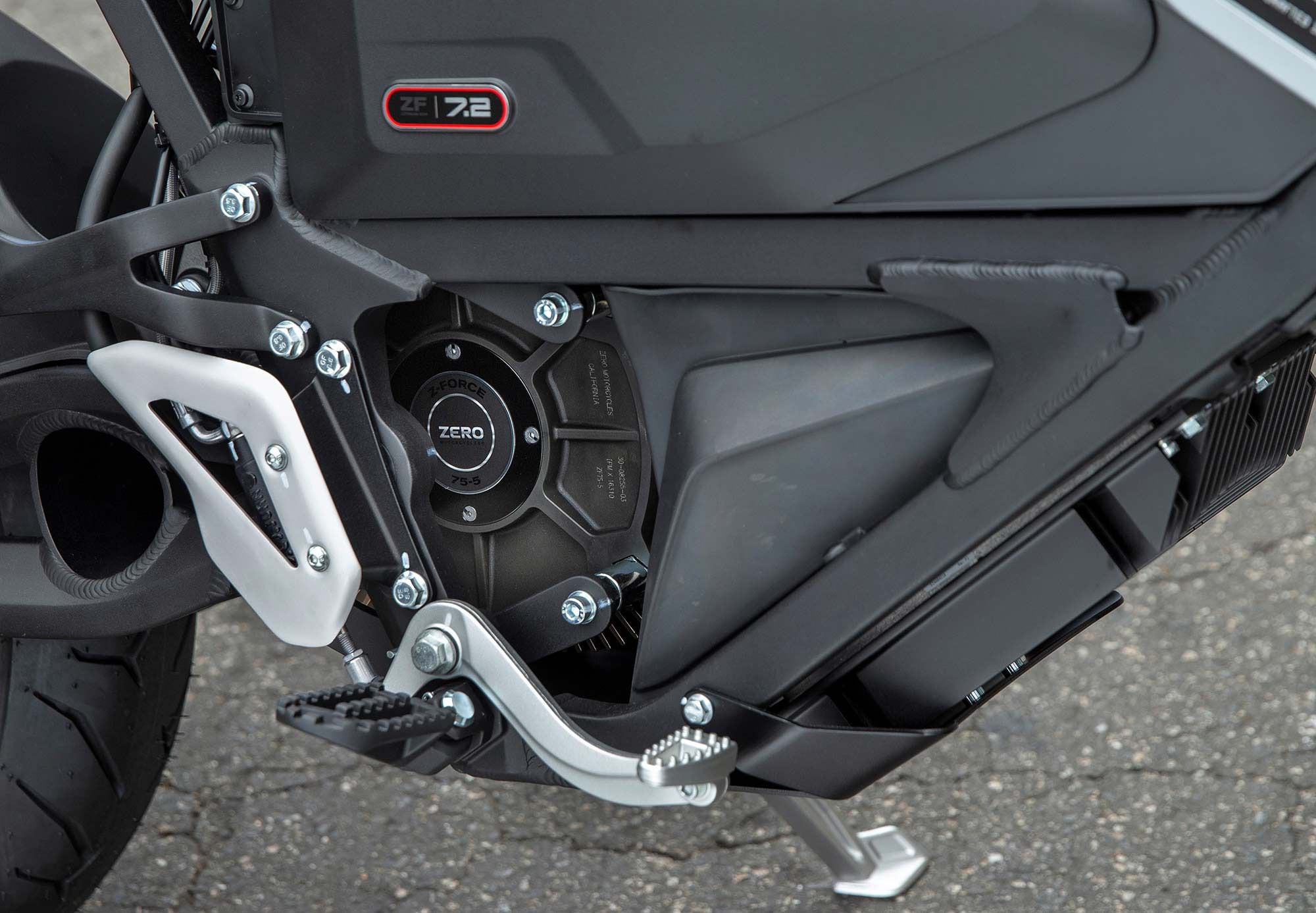 Steel frame holds the tried-and-true ZF 75-5 air-cooled motor in the FXE, rated at 46 hp. The 7.2kWh battery is not removable.