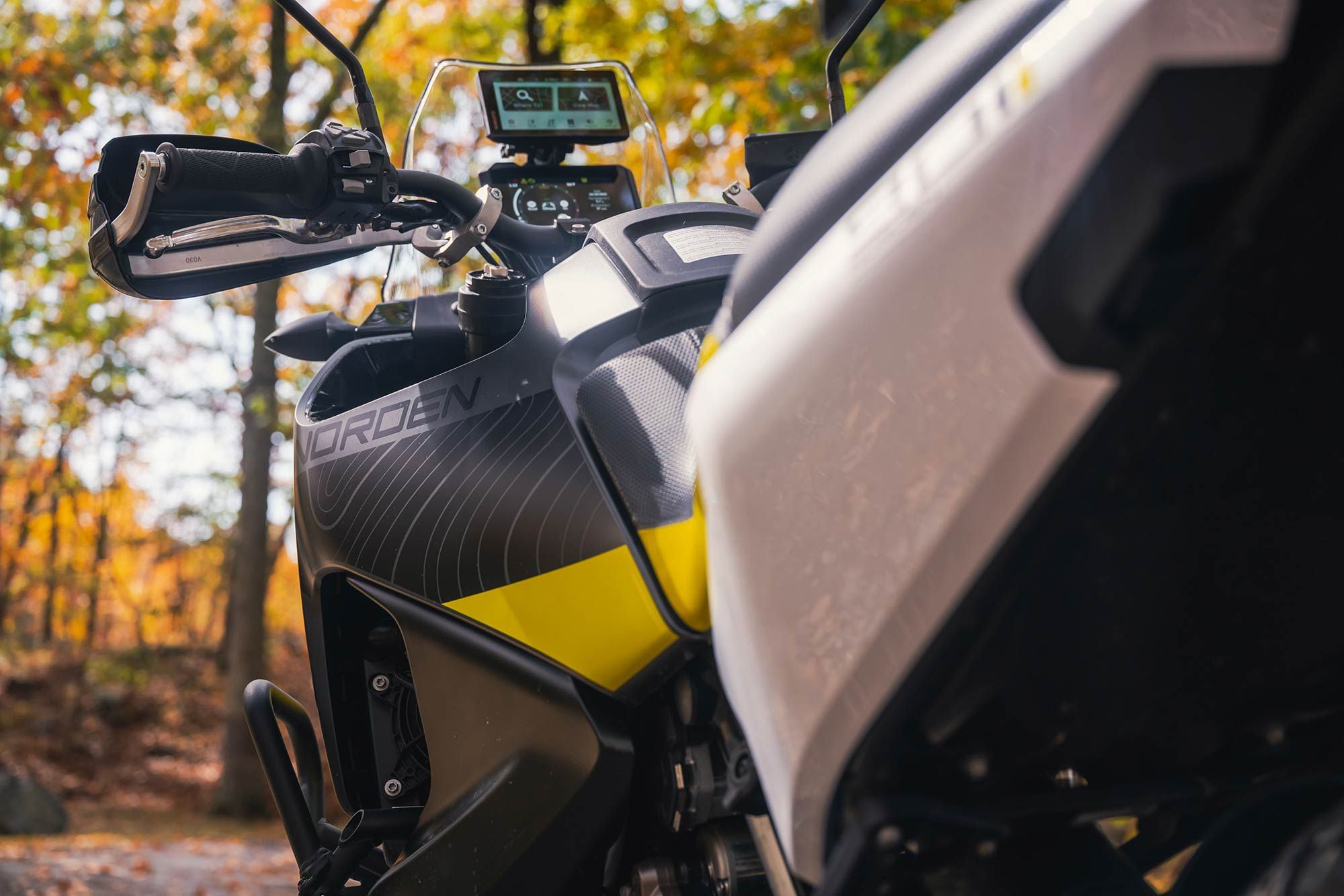 The Norden’s switch gear is typical KTM fare, so the buttons feel like Chiclets, though backlit Chiclets it must be said. In-mold graphics look more high-quality than stickers.