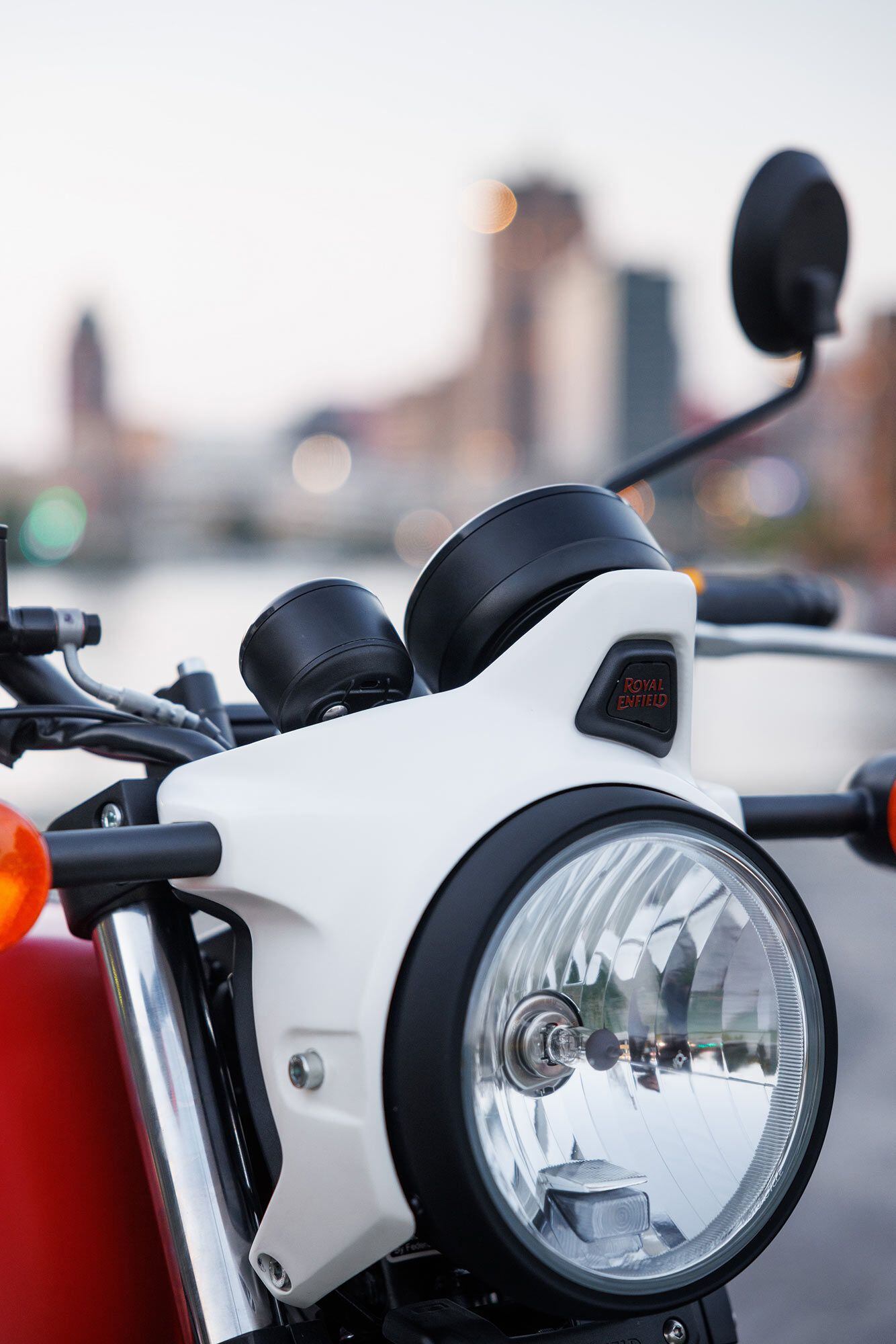 Cast metal cowling streamlines the round headlamp to give the Scram a more modern vibe.