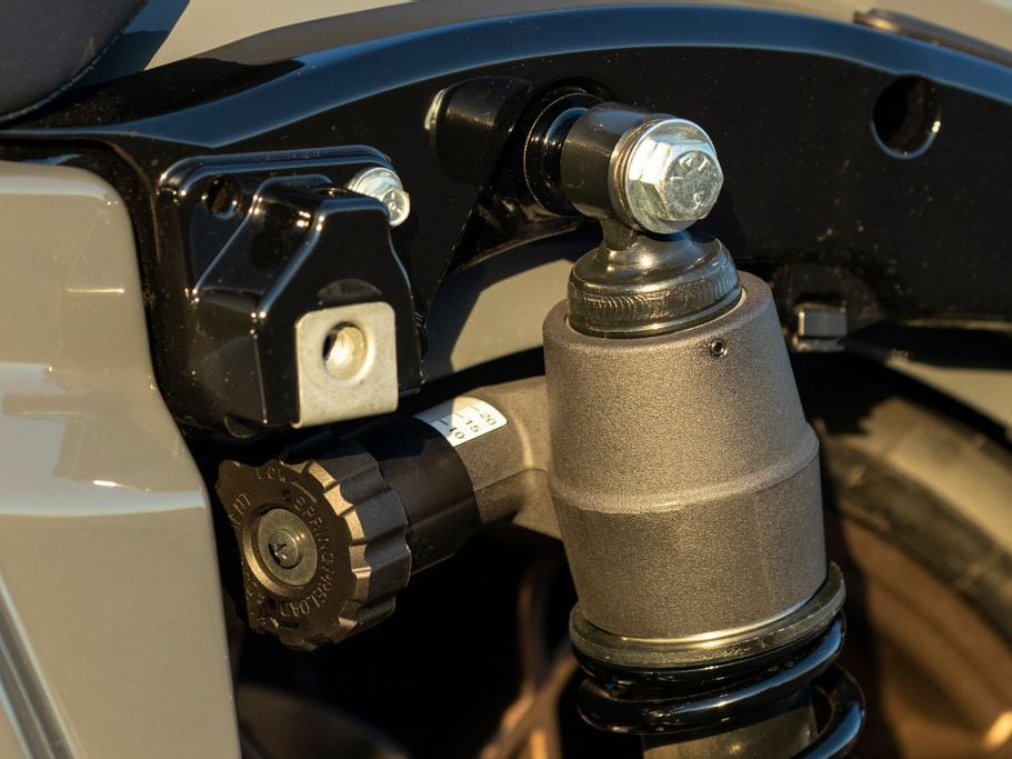 Hand-adjustable rear shocks on the ST models have 3 inches of travel, compared to 2.1 inches on Special models.