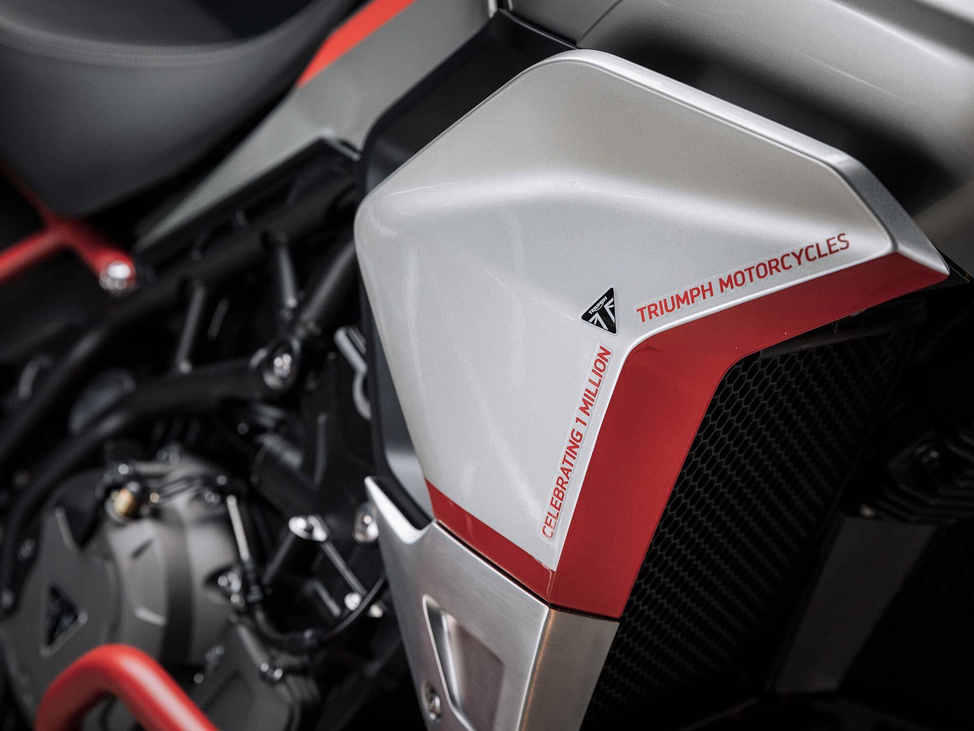 “Celebrating 1 Million” graphics extend to the radiator shrouds and other bodywork.