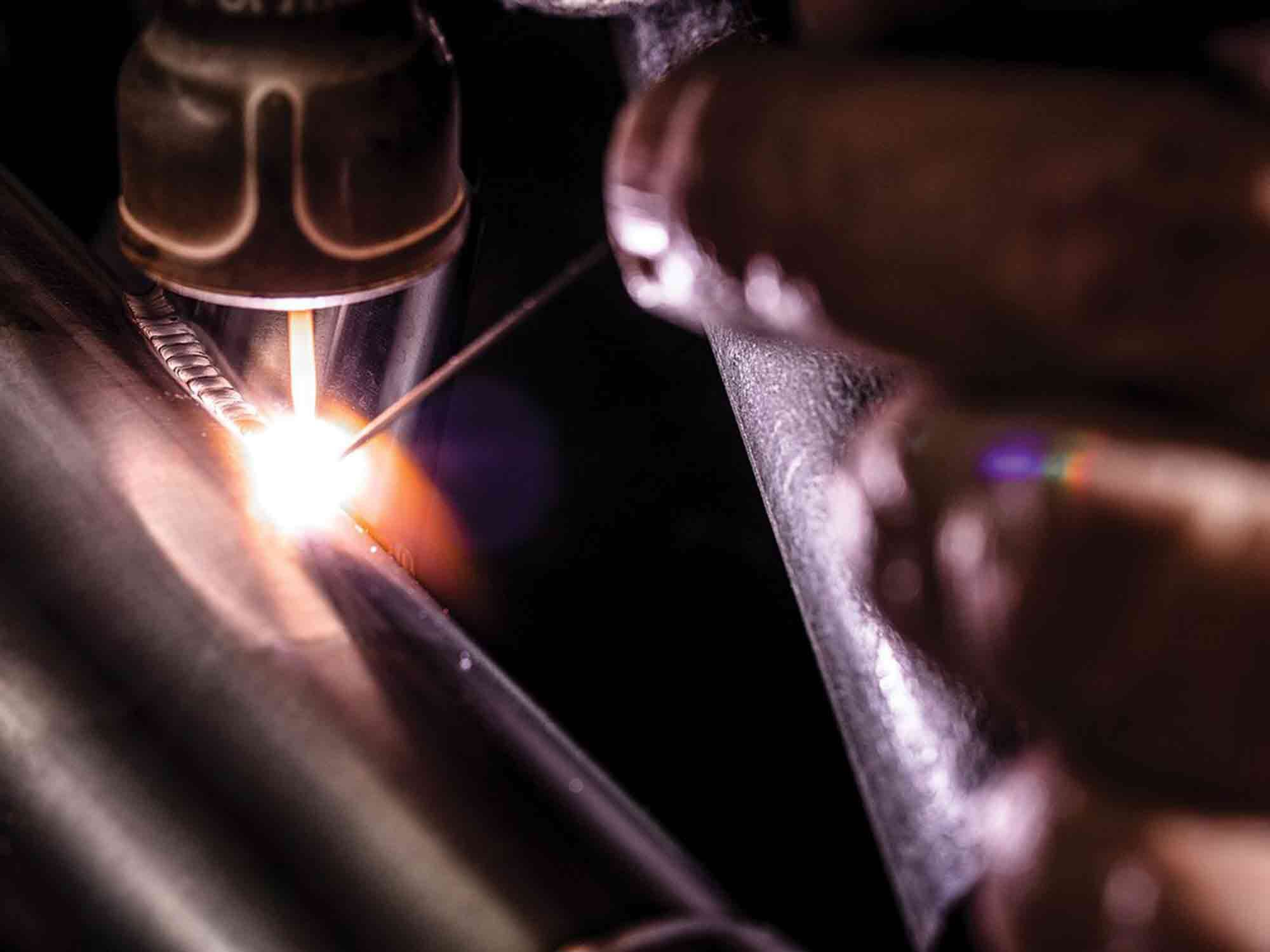 Homegrown solutions to the TZ750′s flat-pipe dilemma appeared out of necessity.