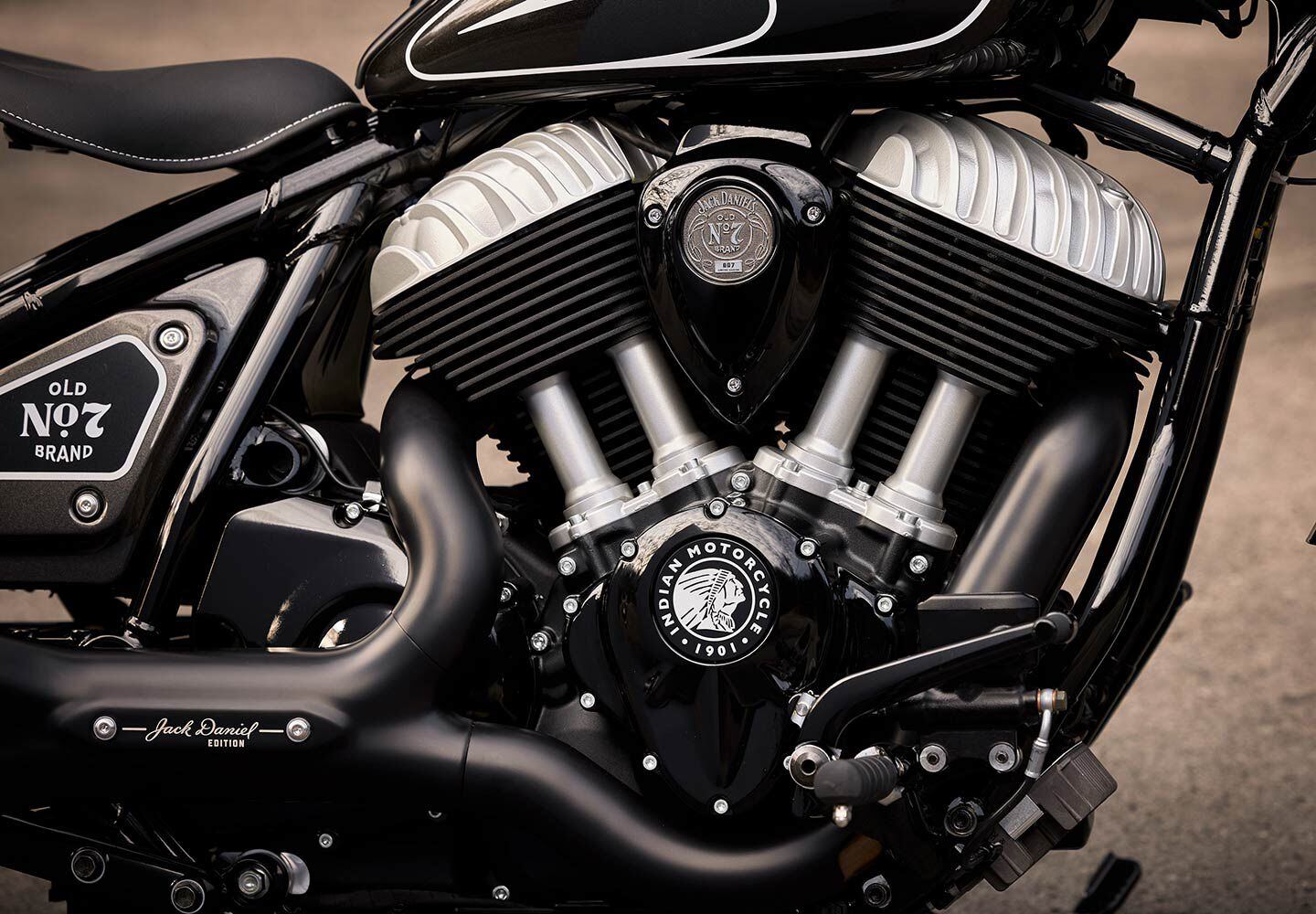 The blacked-out Thunderstroke 116 engine carries over from the Chief Dark Horse unchanged, save for cosmetic treatment on the cylinders and heads. Jack Daniel’s Montana Silversmiths badges tucked between the jugs display each bike’s unique serial number.