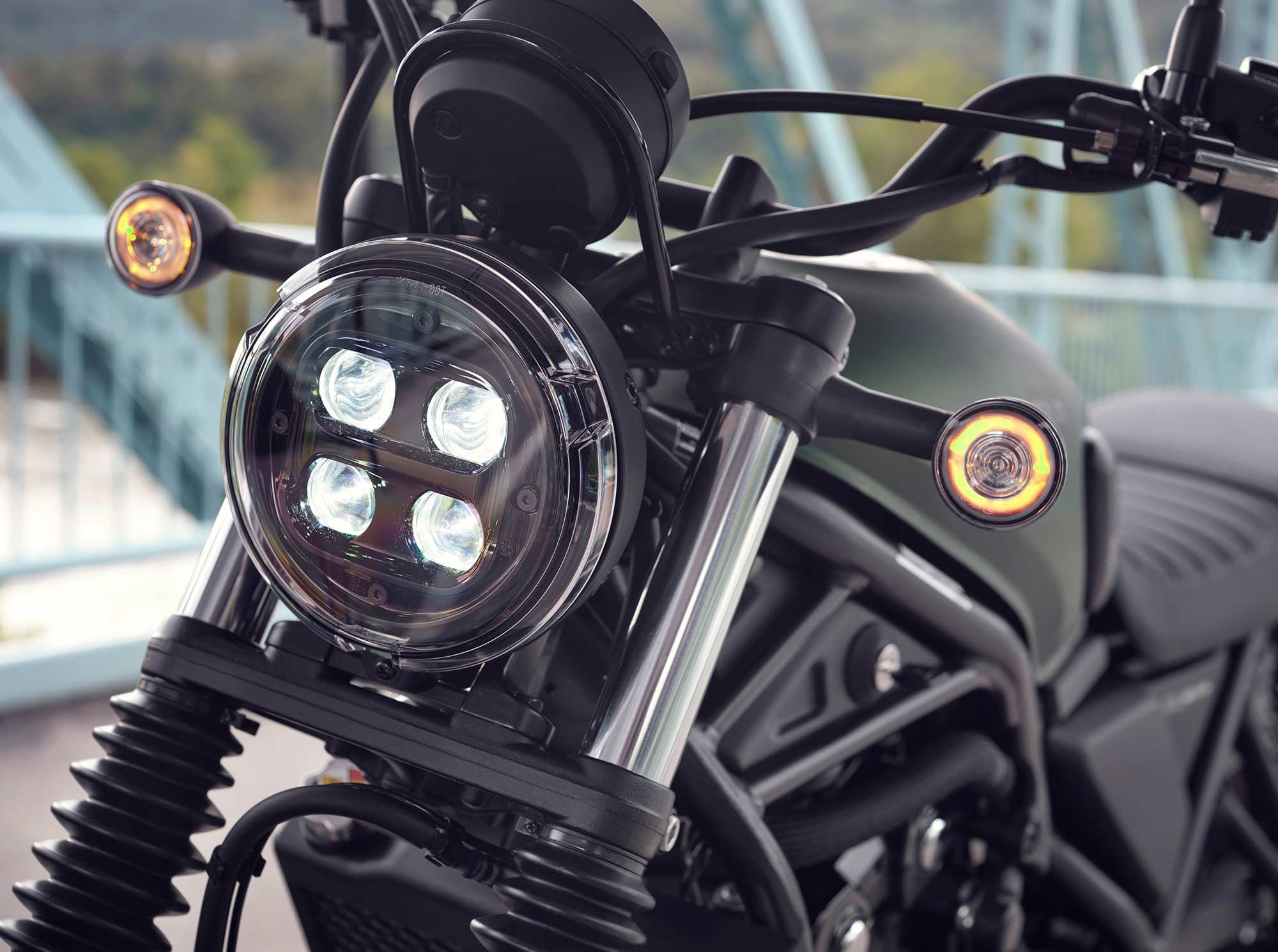 The circular headlight features four LED bulbs and is borrowed from the Rebel 500.