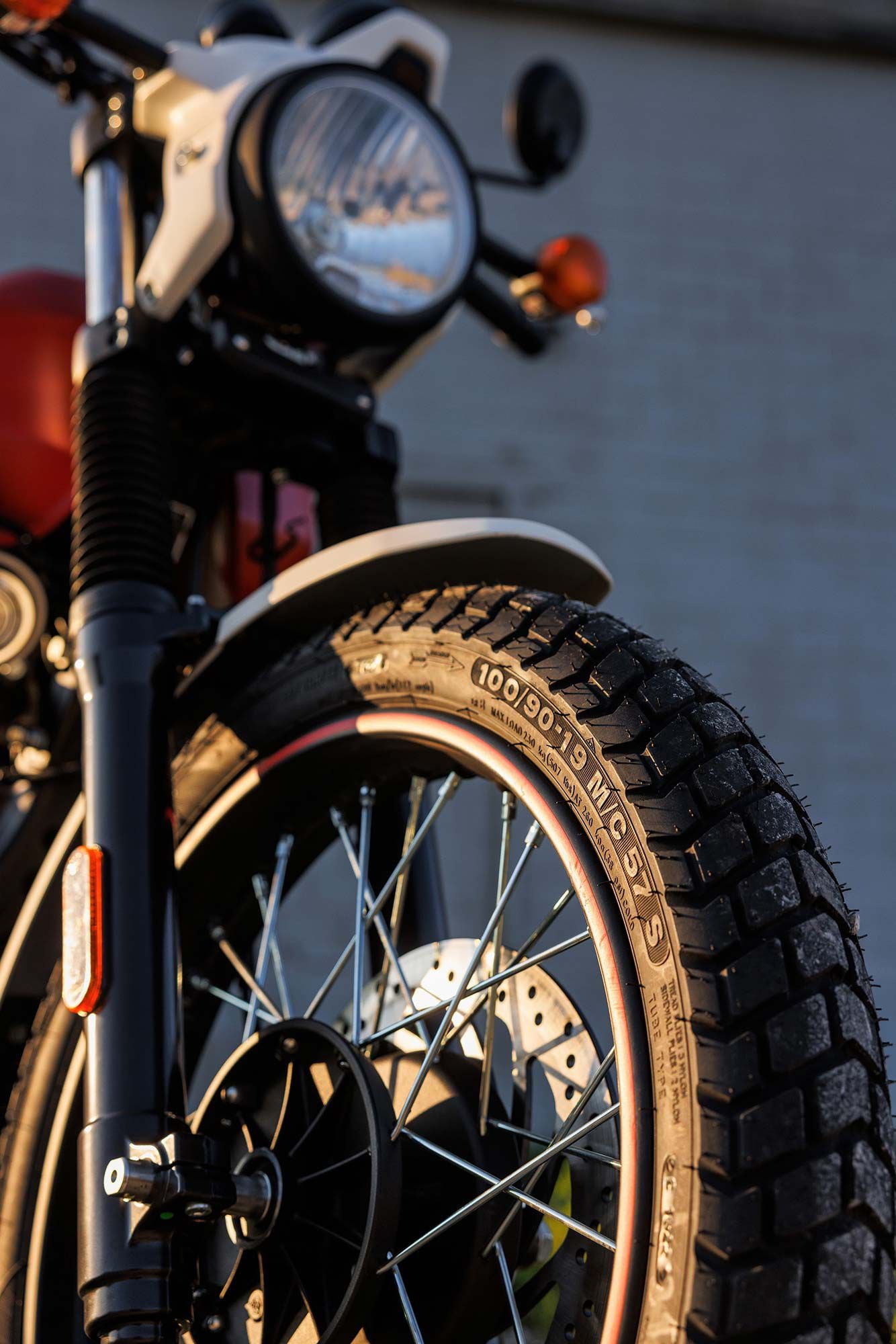 The most notable difference is the Scram’s street-biased geometry, which includes a 19-inch front wheel now mounted with Ceat rubber.