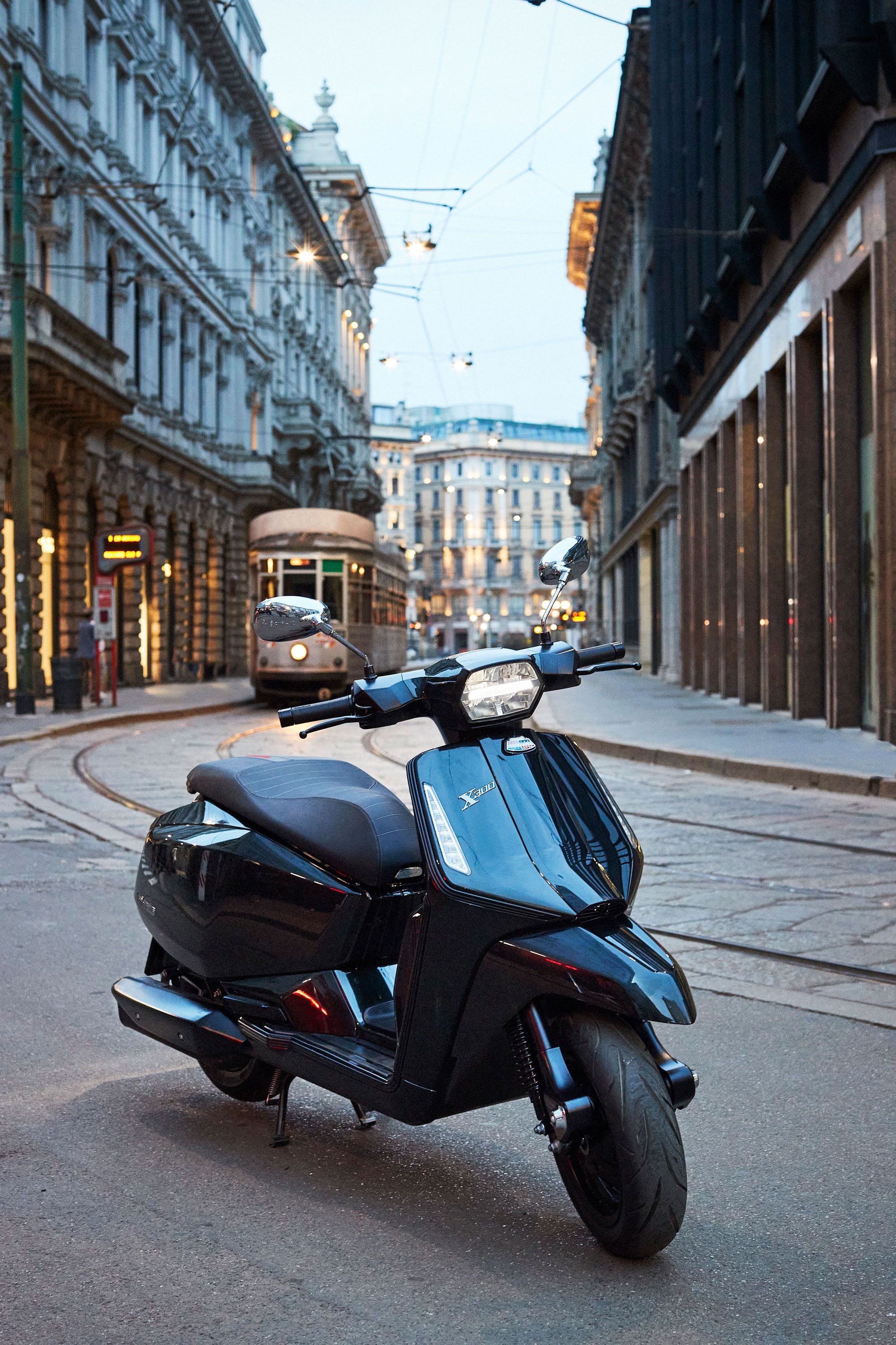 Old world meets Brave New World. The new Lambretta X300 parked in downtown Milan, home of the original Lambretta 75 years ago.