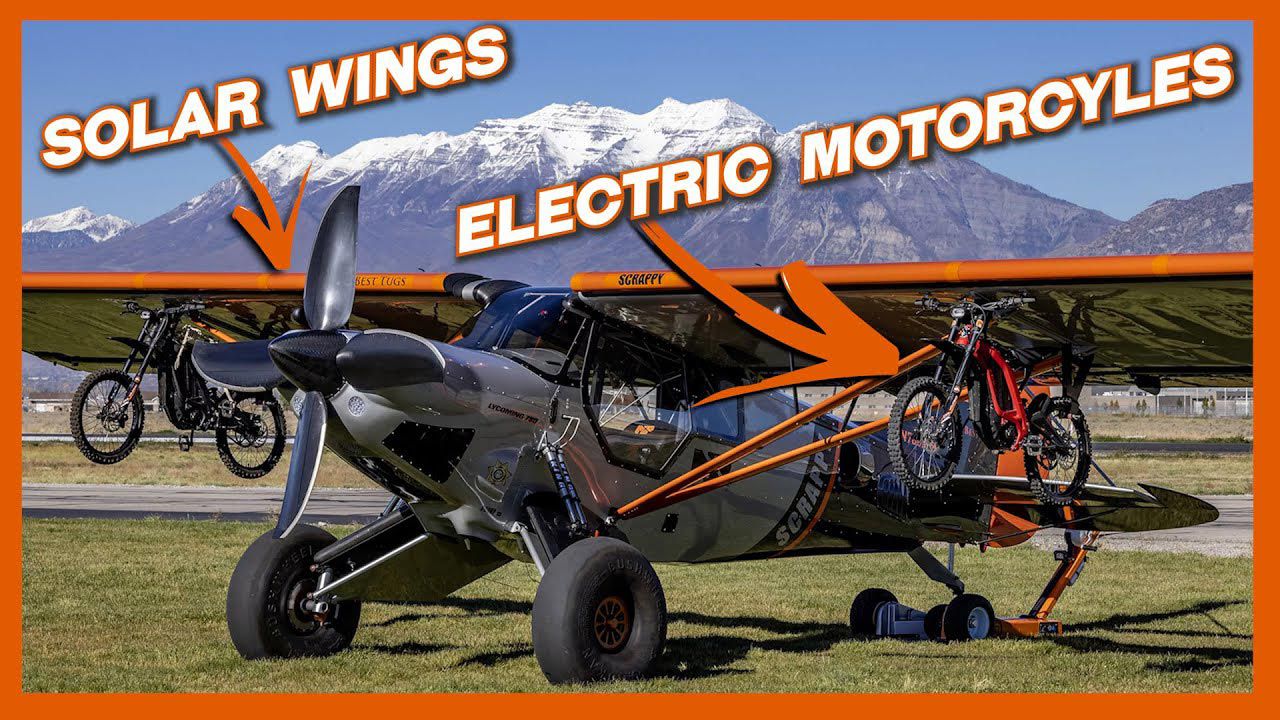 “Scrappy,” Mike Patey’s bush plane with solar panels on its wings, hauls two Segway Dirt eBike X260s.