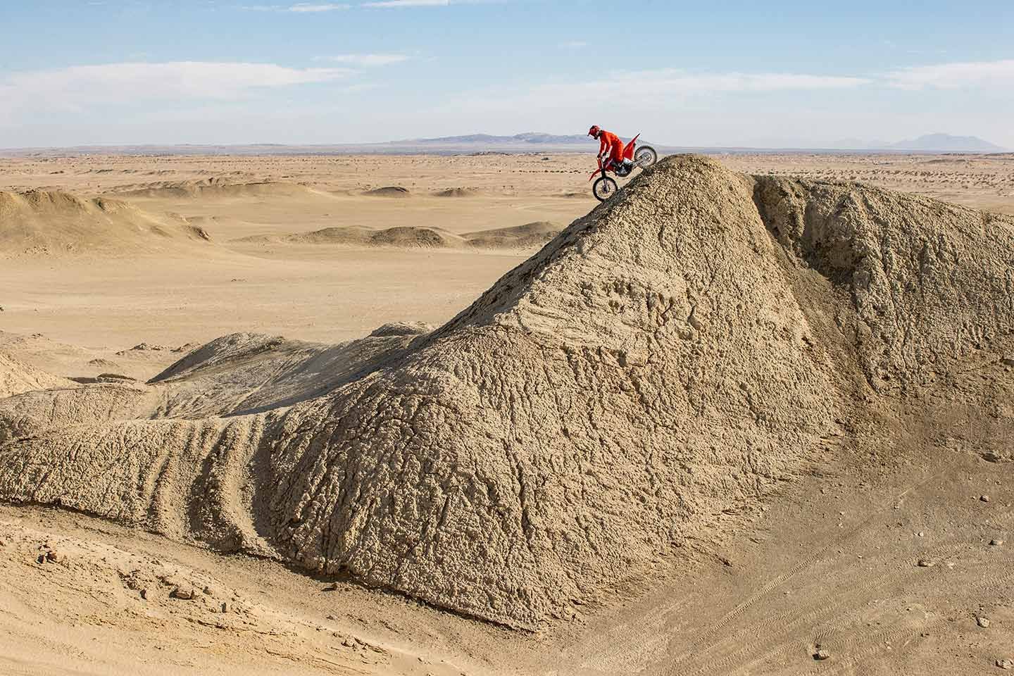 After a tricky hill climb, test rider Michael Wicker works his way down a steep decline.