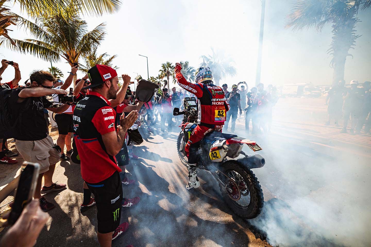 Van Beveren celebrates with some tire smoke at the finish of the Dakar Rally 2024.