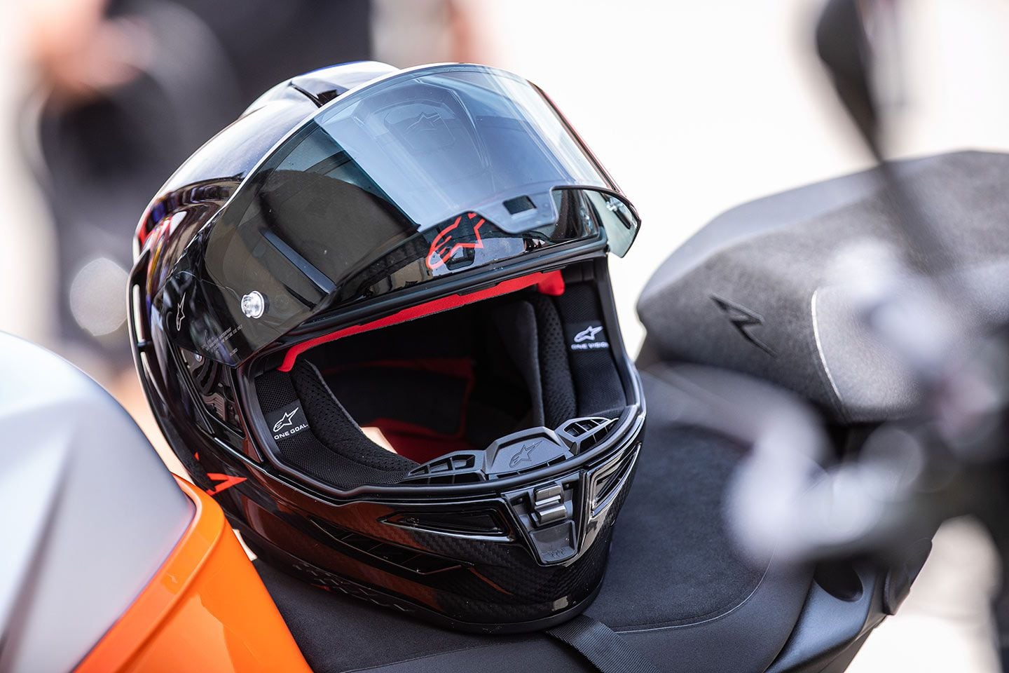 Metal hardware is used to attach and lock the visor, for durability and to ensure that the visor doesn’t pop up in the event of a crash. Most of our frustrations with the helmet center on getting comfortable with this visor setup, which takes a little time to get used to. Notice the rubber cover for the chin bar vent.