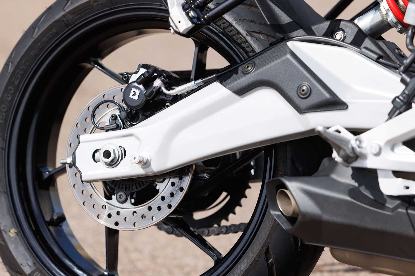 The steel swingarm mounts directly to the engine and the rear brake system utilizes a 220mm disc with a dual-piston ByBre caliper.