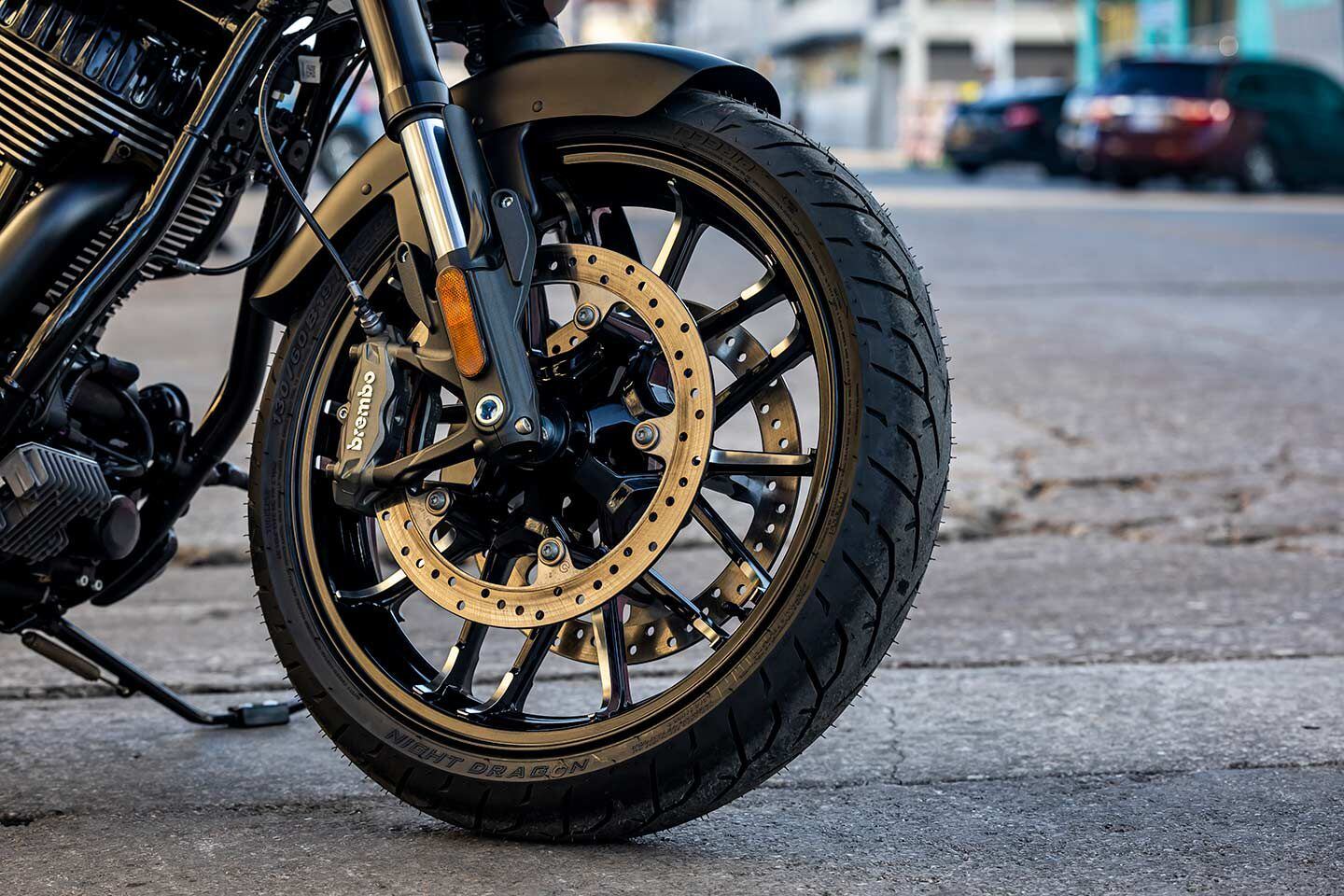 Top-shelf Brembo radial-mount brakes with huge 320mm rotors are hung on an inverted KYB fork.