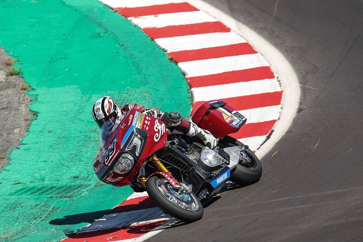 Tyler O’Hara flicking the Challenger through the bottom of Laguna Seca’s famed Corkscrew.