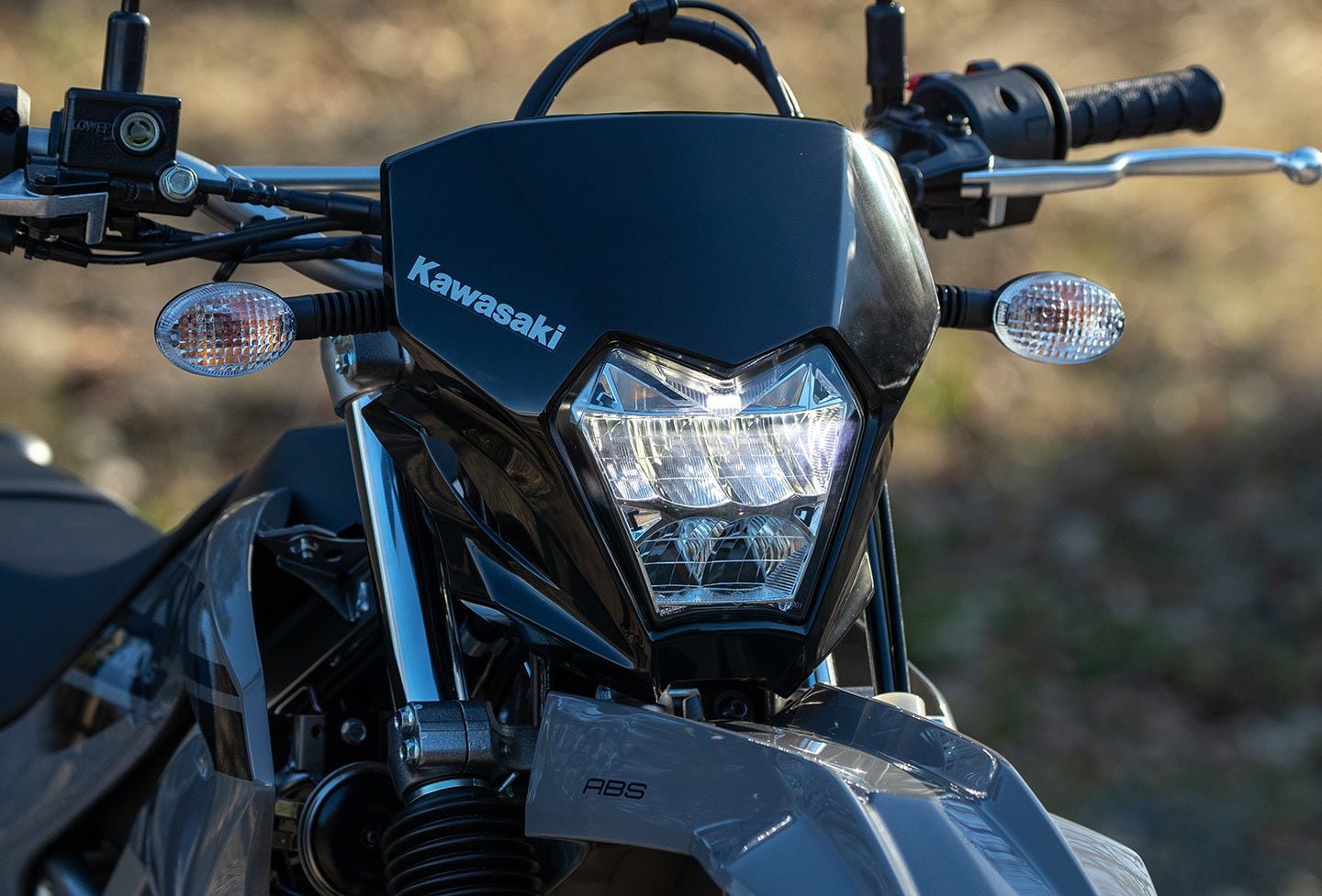 New to the KLX230 lineup for model year 2023, an LED headlight and reshaped cowl give the Kawasaki a modern look.