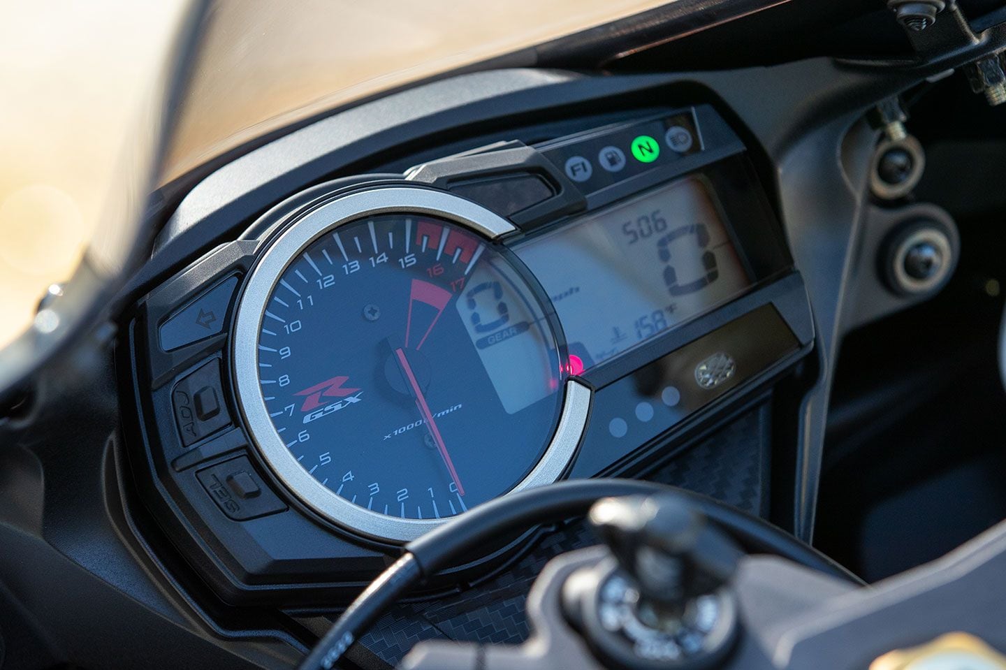 Suzuki's GSX-R600 is fitted with a simple dash utilizing an analog tachometer and digital speedometer and gear position indicator.