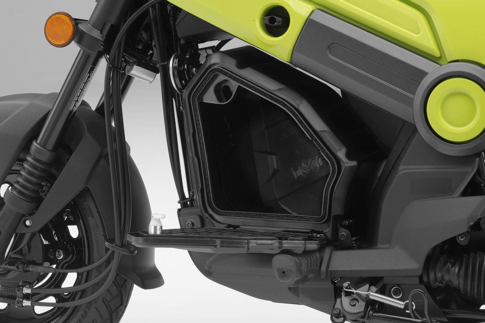The Navi features a lockable storage compartment in the middle of the chassis.