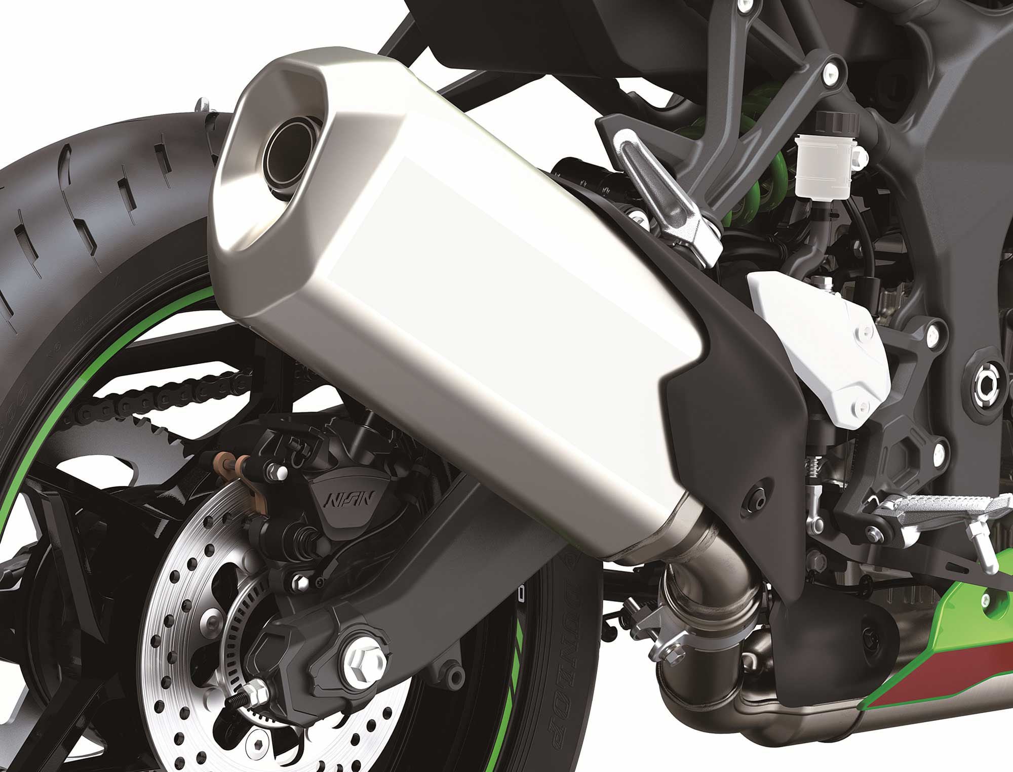A long, traditional-style exhaust silencer is downstream from a trio of catalytic converters.