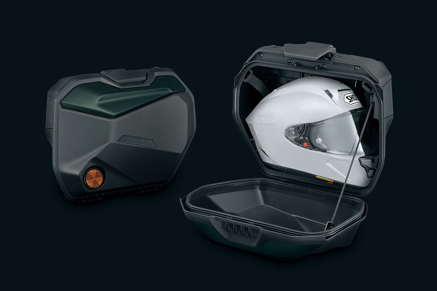 Side cases have 25.7 liters (0.9 cubic feet) of storage space and an 11-pound weight capacity. Our size medium helmet fit, even if just barely. Notice the Pearl Matte Shadow Green color.