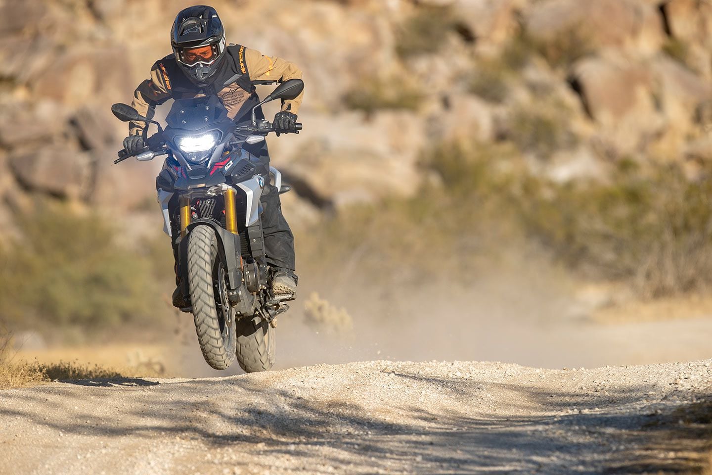 The GS’s short windscreen allows the rider to get their head over the front of the bike in an off-road setting.