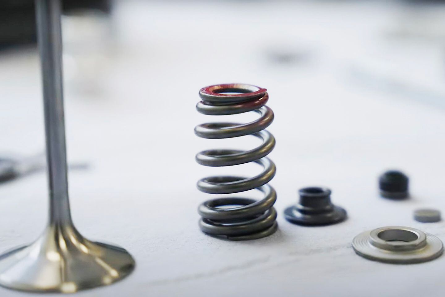 Triumph’s 250cc motocross engine has “beehive” valve springs.