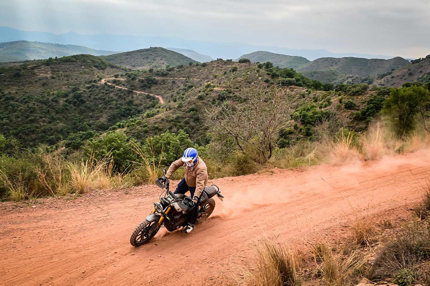 The Scrambler 400 X will get you down a dirt mountain road without any issue.