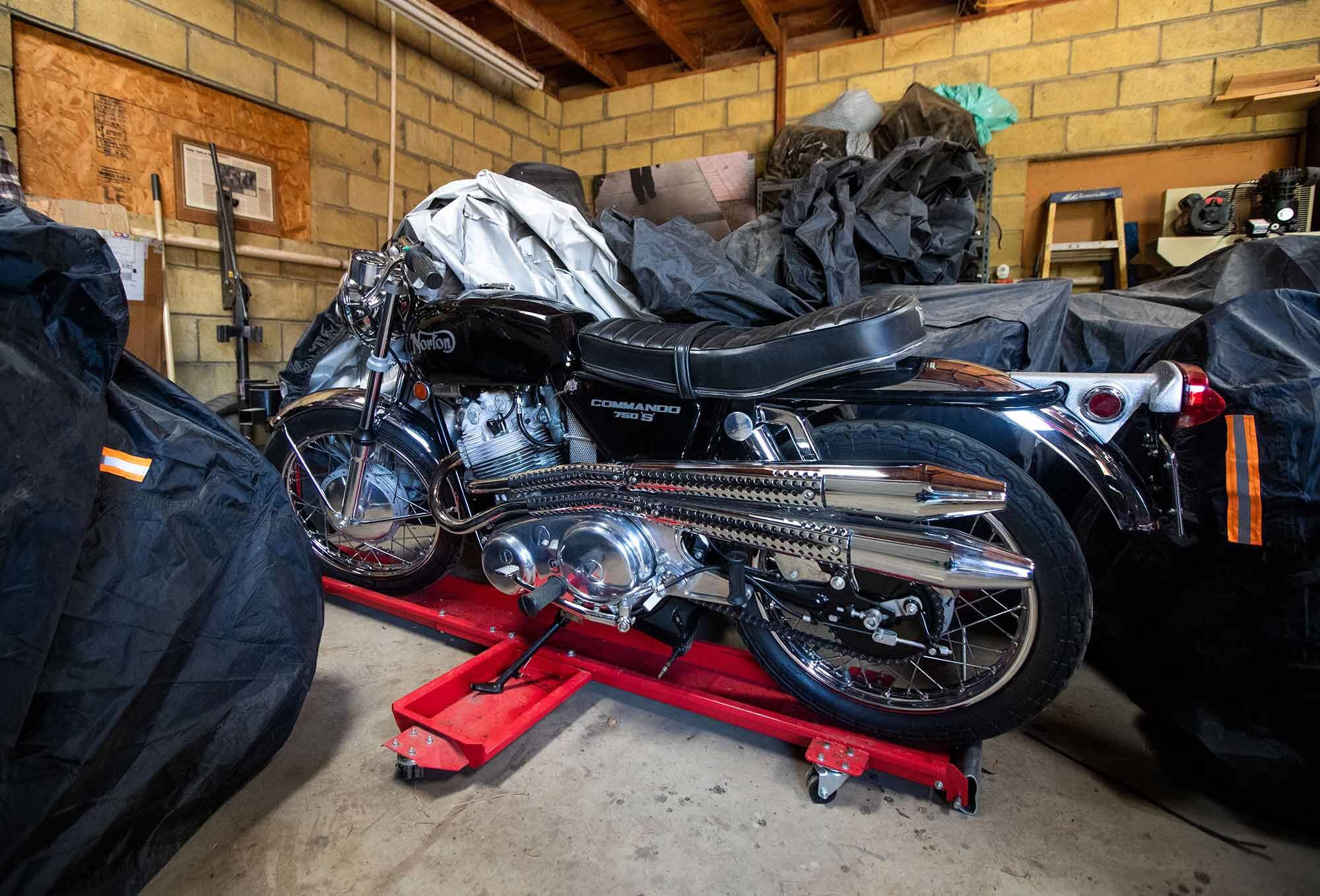 Inside one of the many small barns that Haith constructed to house his collection were treasures like this pristine 1970 Norton Commando 750S, often wrapped in protective plastic.