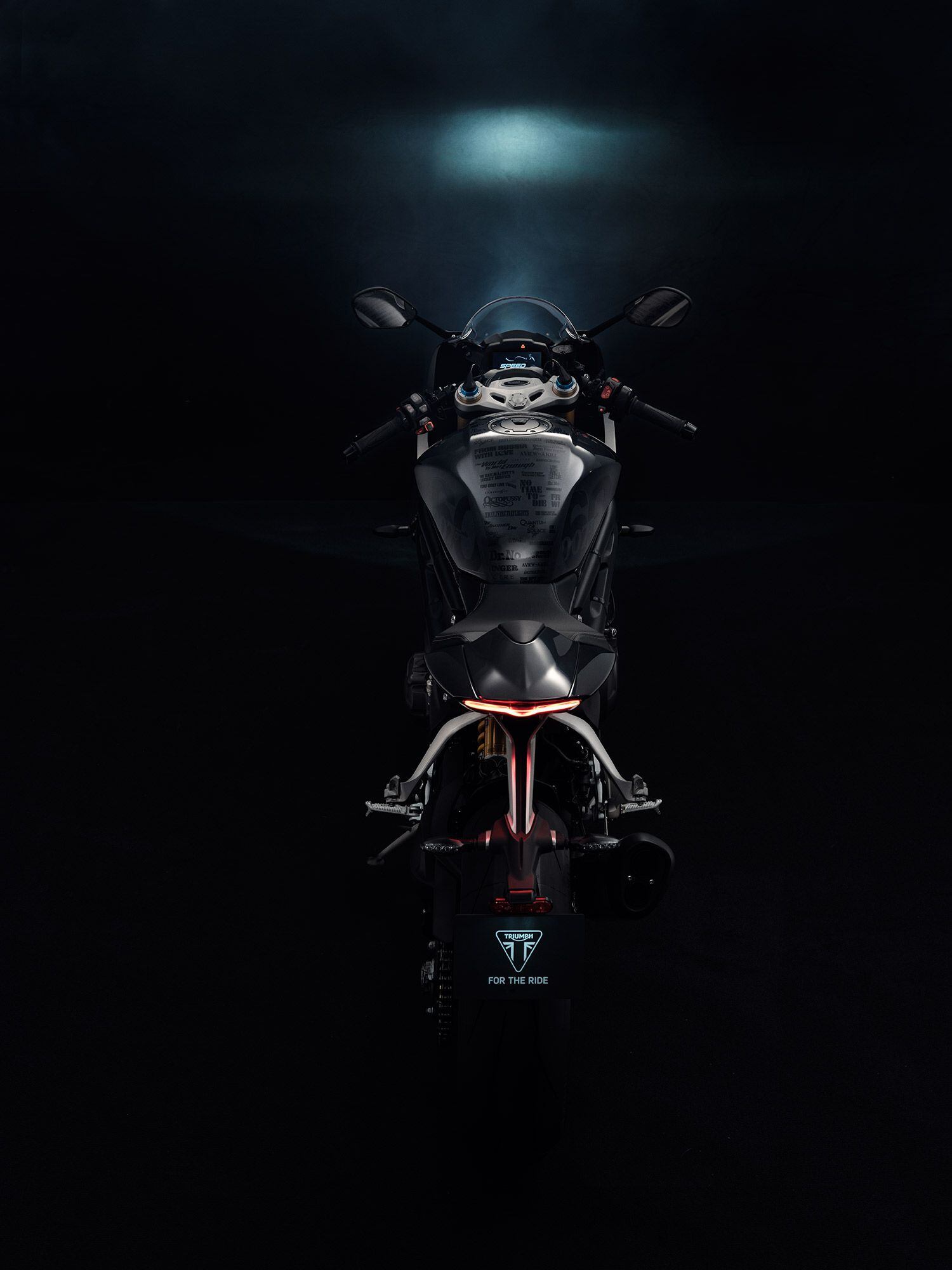 The Speed Triple RR Bond Edition’s cockpit is designed to mimic a gun barrel “reminiscent of probably the most iconic film opening sequence of all time.”