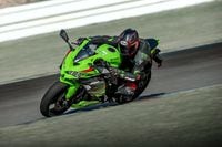 2023 Kawasaki Z X 4 R R left corner lean on race track