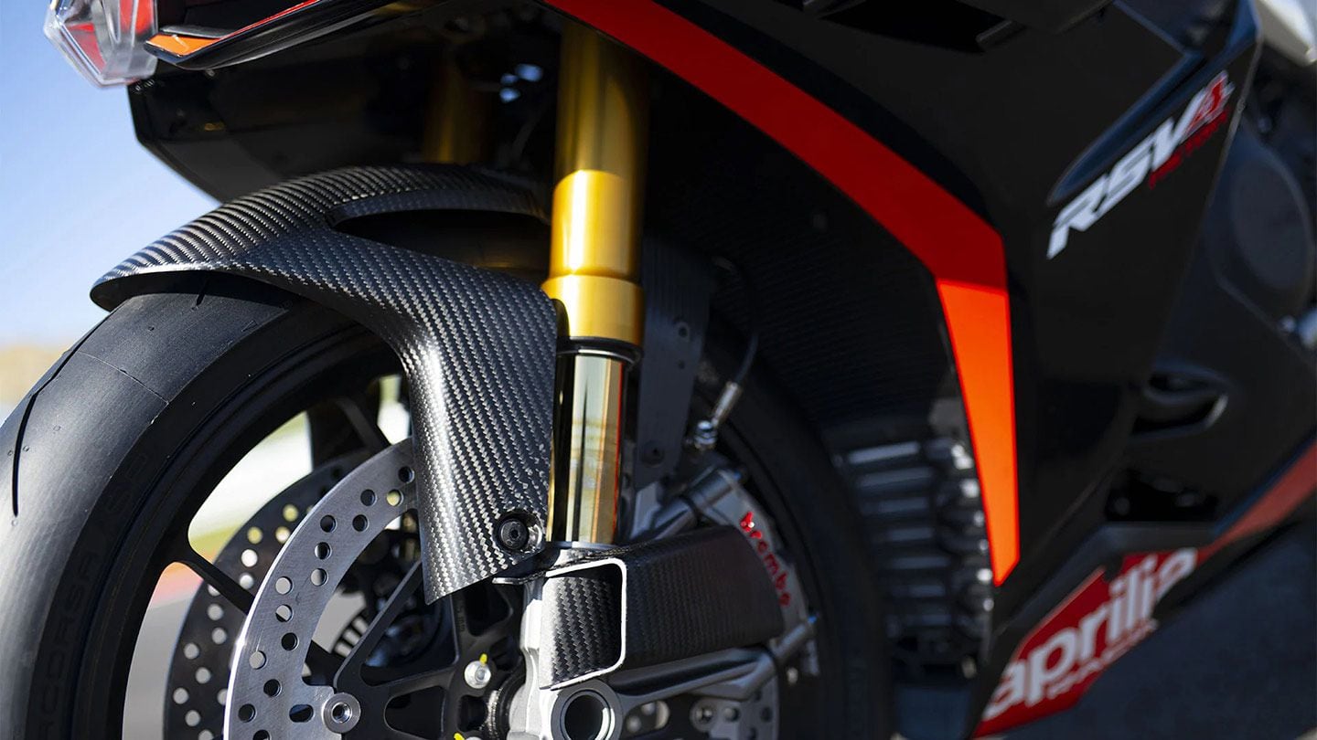 The RSV4 and Tuono Factory SBK tribute bikes both sport carbon front brake air intakes and a carbon front fender along with the special black and red livery.