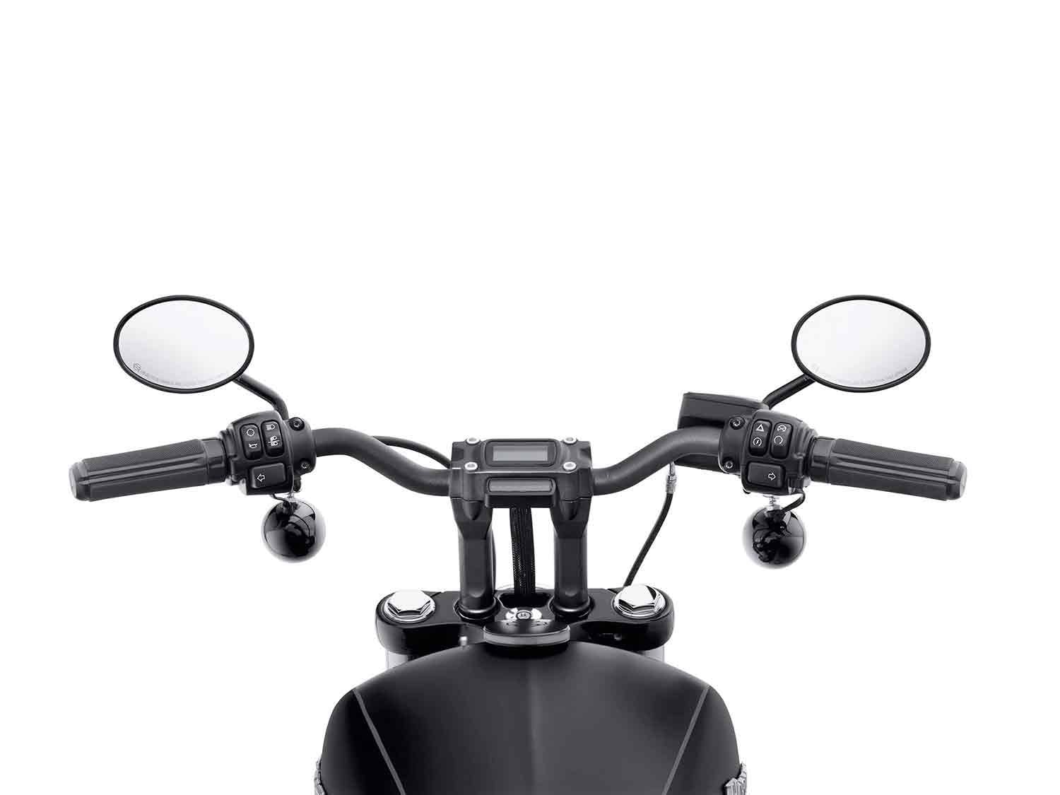The 1-inch Moto Bar (mounted on 5.5-inch risers) is straighter and lower than the stock mini-apes, effectively dropping shoulders and lessening fatigue at speed, especially on long distances.
