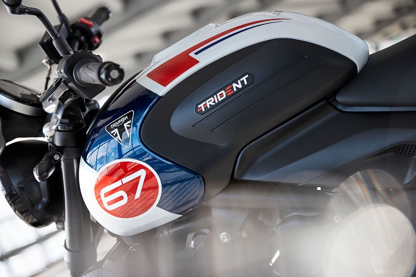The tank covers wear the number 67 in honor of Slippery Sam, Triumph’s historic TT-winning T150 Trident.