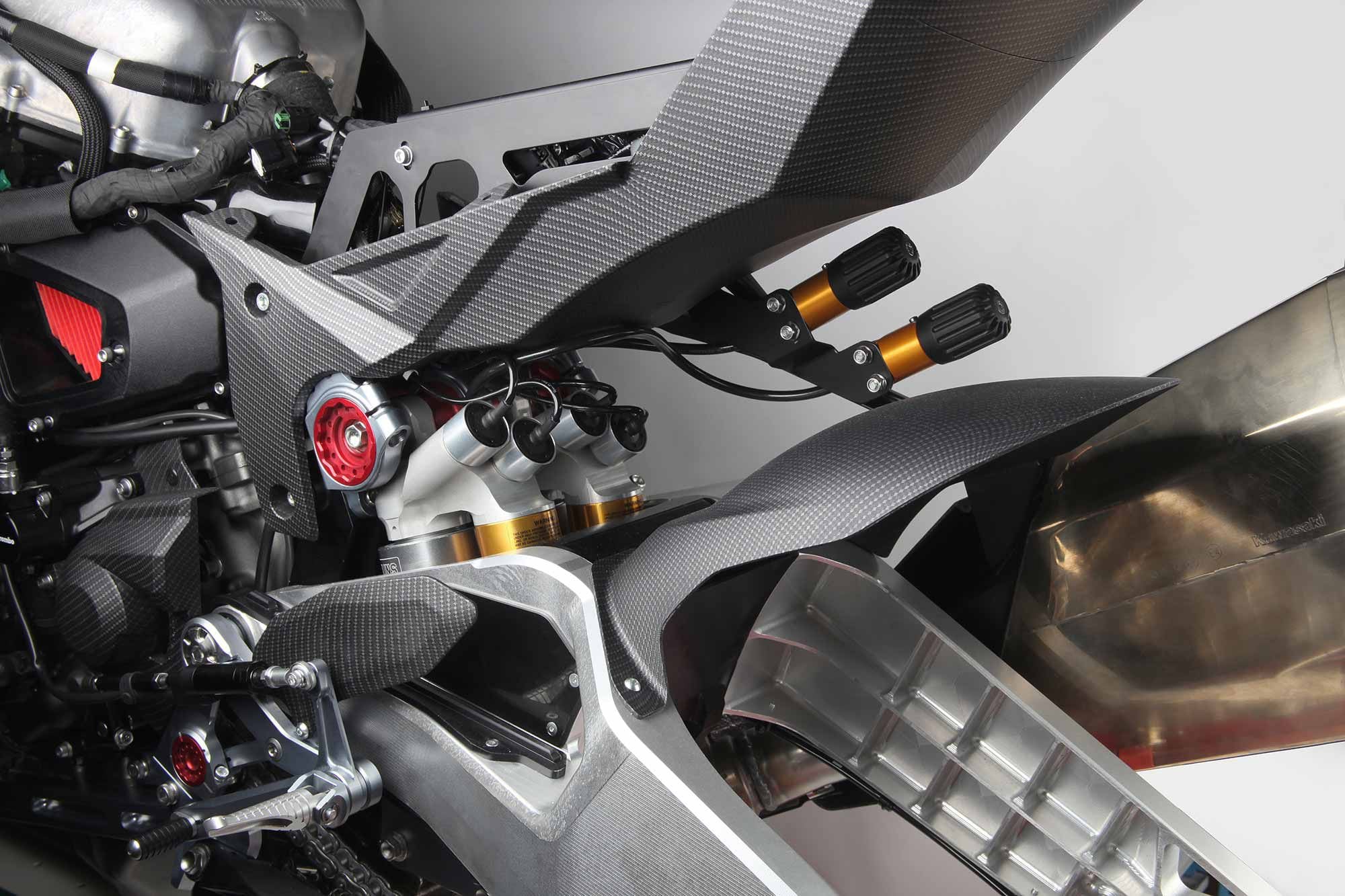 Tesi H2 rear swingarm with wheel dismounted, allowing a clear view of the fascinating side-by-side arrangement of the front and rear shocks.