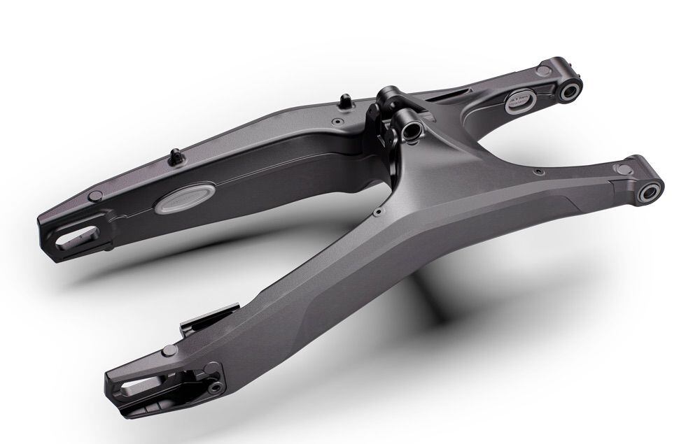 A new swingarm is gravity die-cast (versus pressure die-cast), resulting in a 3.3-pound weight savings. Stiffness is reduced for increased bump absorption.
