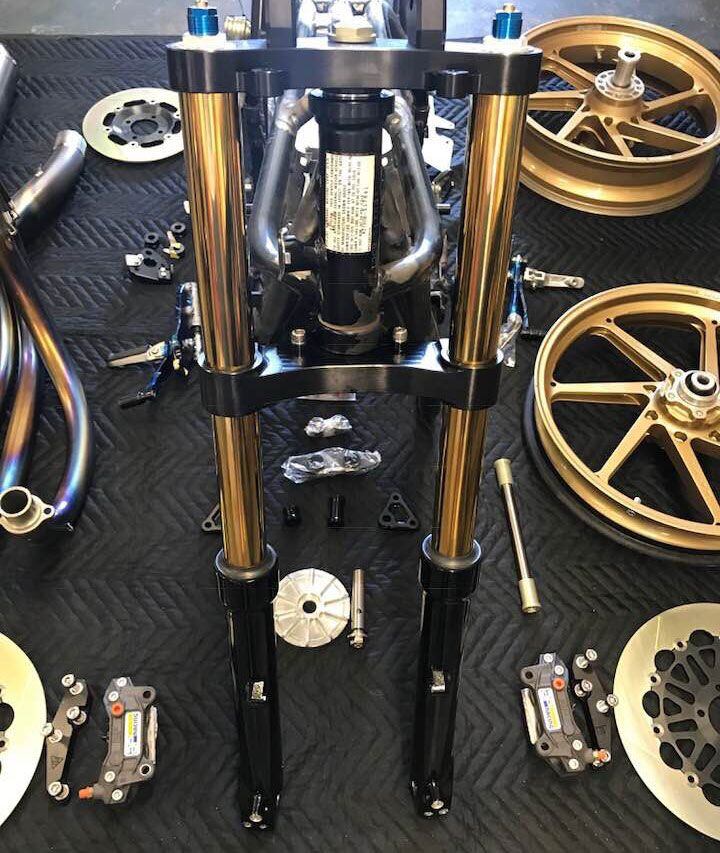 A huge joy of project bikes is updating pieces, and Andrew uses a lot of JB Racing parts. “JB makes the high-end parts I like to use for bikes like this,” the builder told us. Jyo Bito (the JB of JB Racing) is ex-Yoshimura and American Honda racing. The 41mm Kayaba forks are built for JB Racing and are fully adjustable; a front Brembo master cylinder squeezes AP Lockheed calipers. The brake kit, triple clamps, and wheels are JB Racing too.