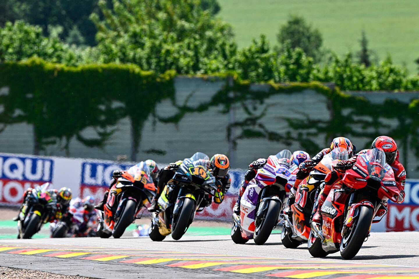 The 2023 MotoGP season in a picture: A pair of KTMs sandwiched by some incredibly quick Ducatis.