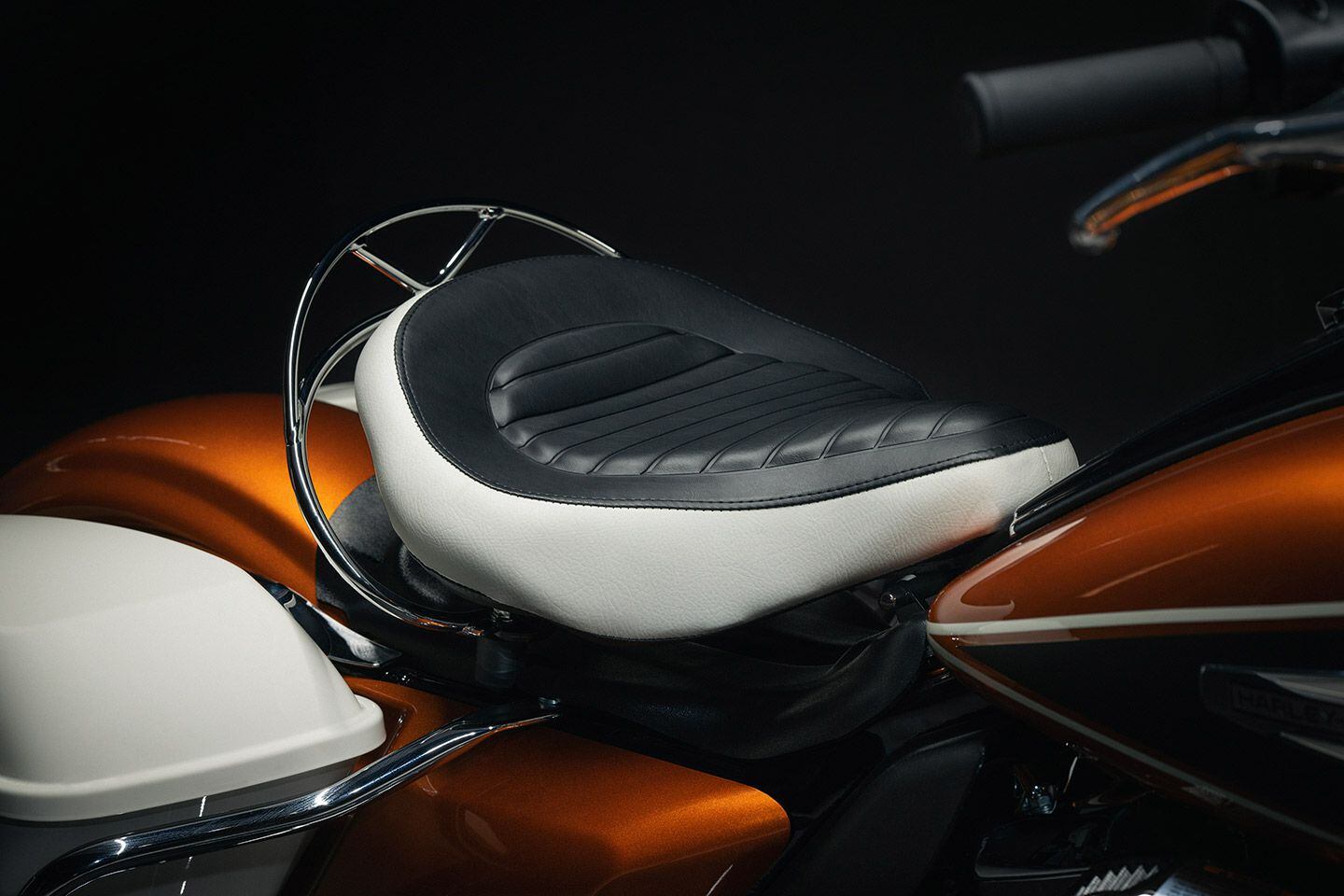 Solo saddle on the Highway King is framed by a chrome rail and mounted over an adjustable coil spring and shock absorber.