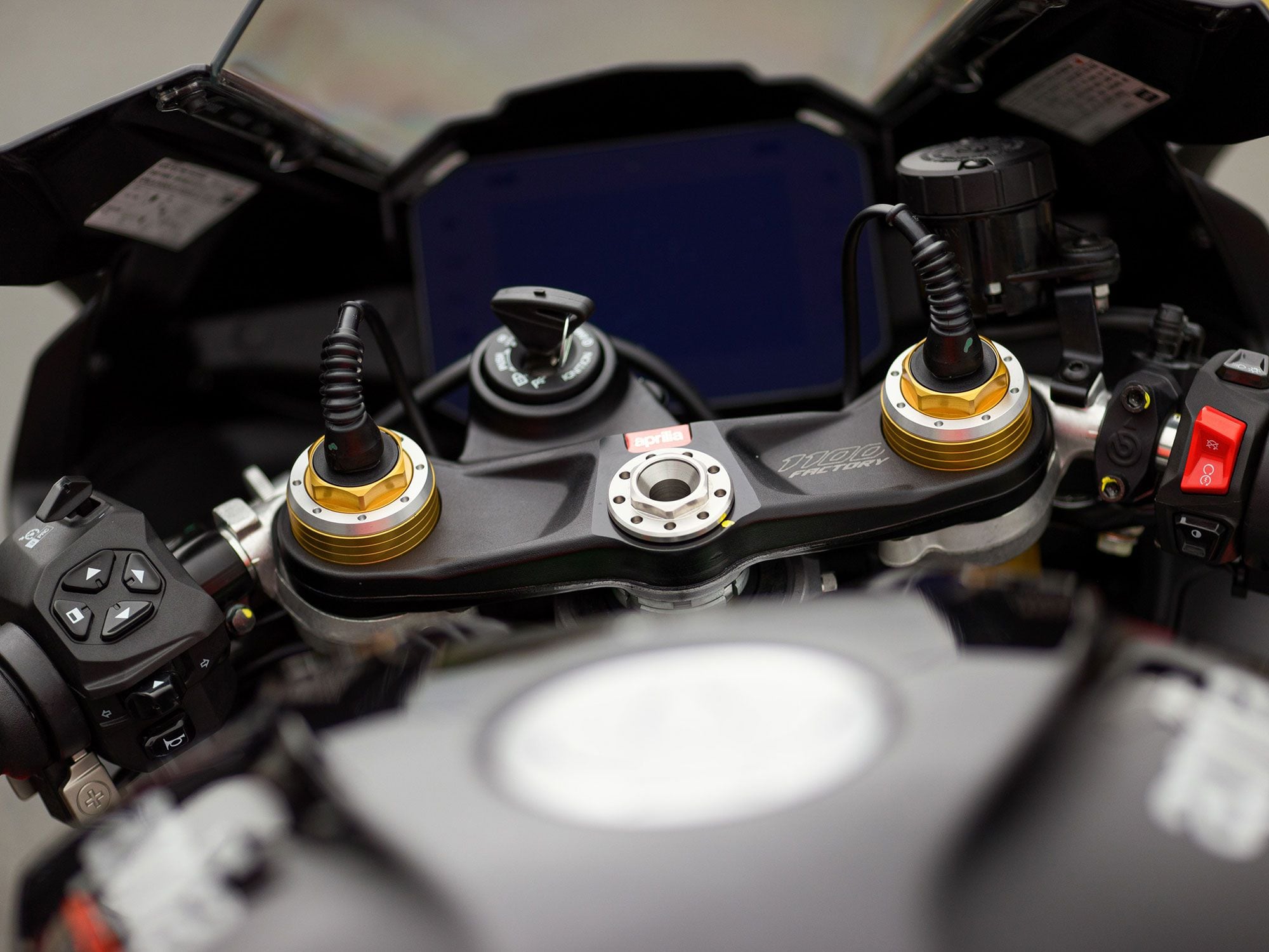 The RSV4 Factory’s cockpit. A new thumb pad replaces the fiddly joystick on the left clip-on, making adjustments and changes to the APRC system easier.