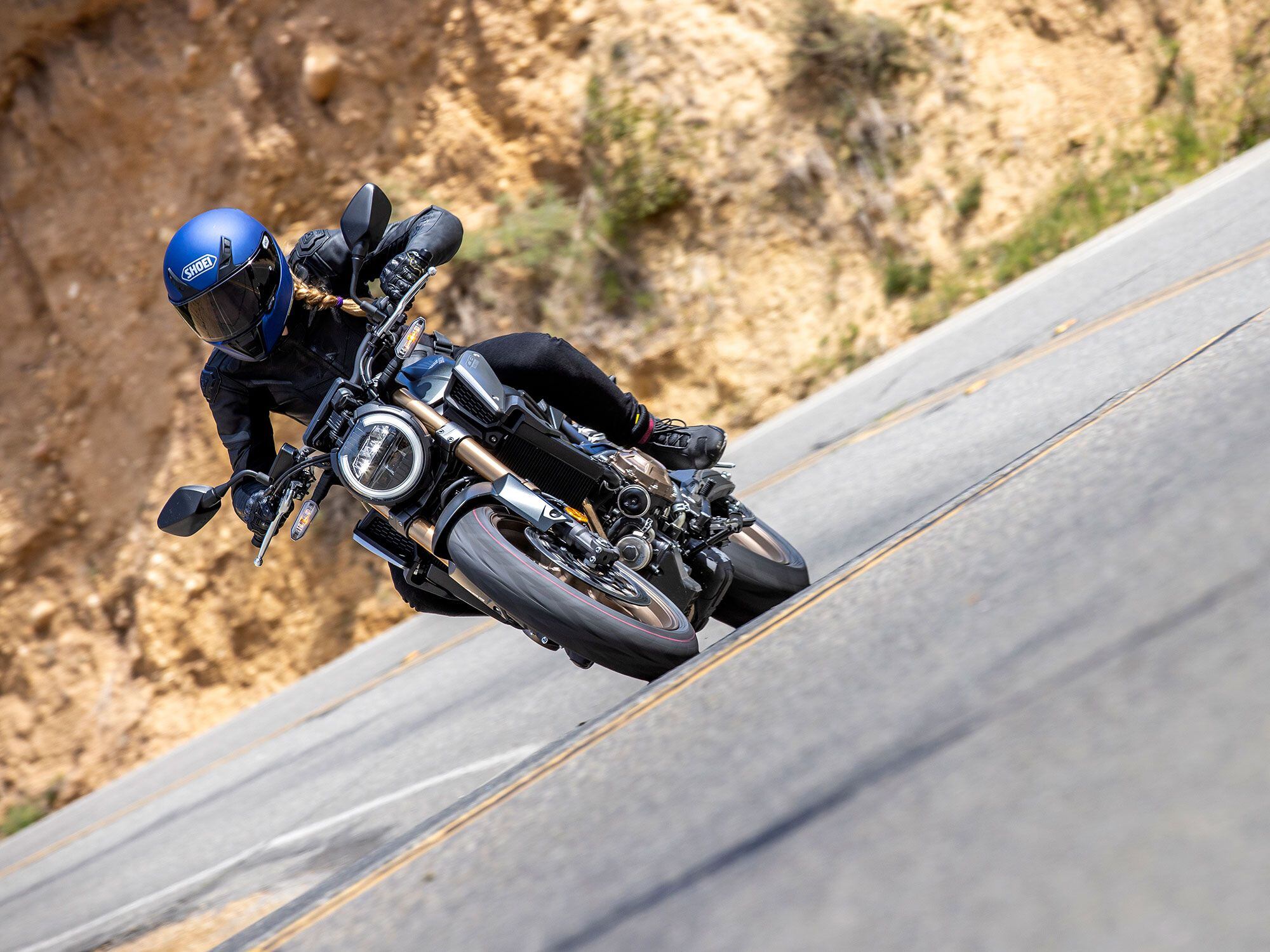 2021-Honda-CB650R-Action.jpg | Less vibration, more smiles. Pass the buzz at the 7,000 rpm mark for more tempting thrills.