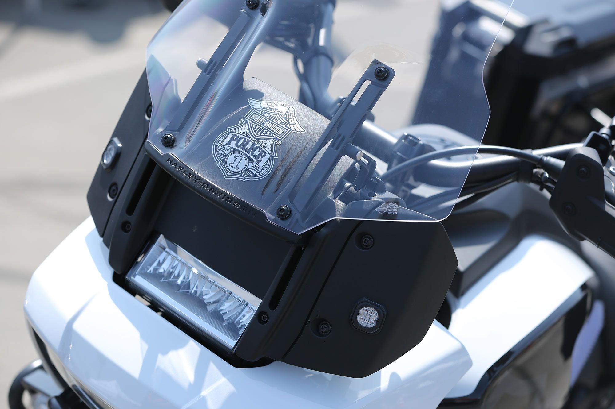 A very official-looking Harley-Davidson police badge on the front of the H-D Pan America…