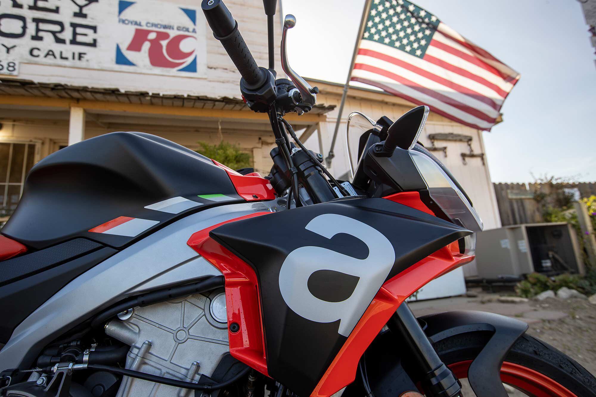 Aprilia’s racing DNA includes these integrated aerodynamic winglets hidden under the side cowling.