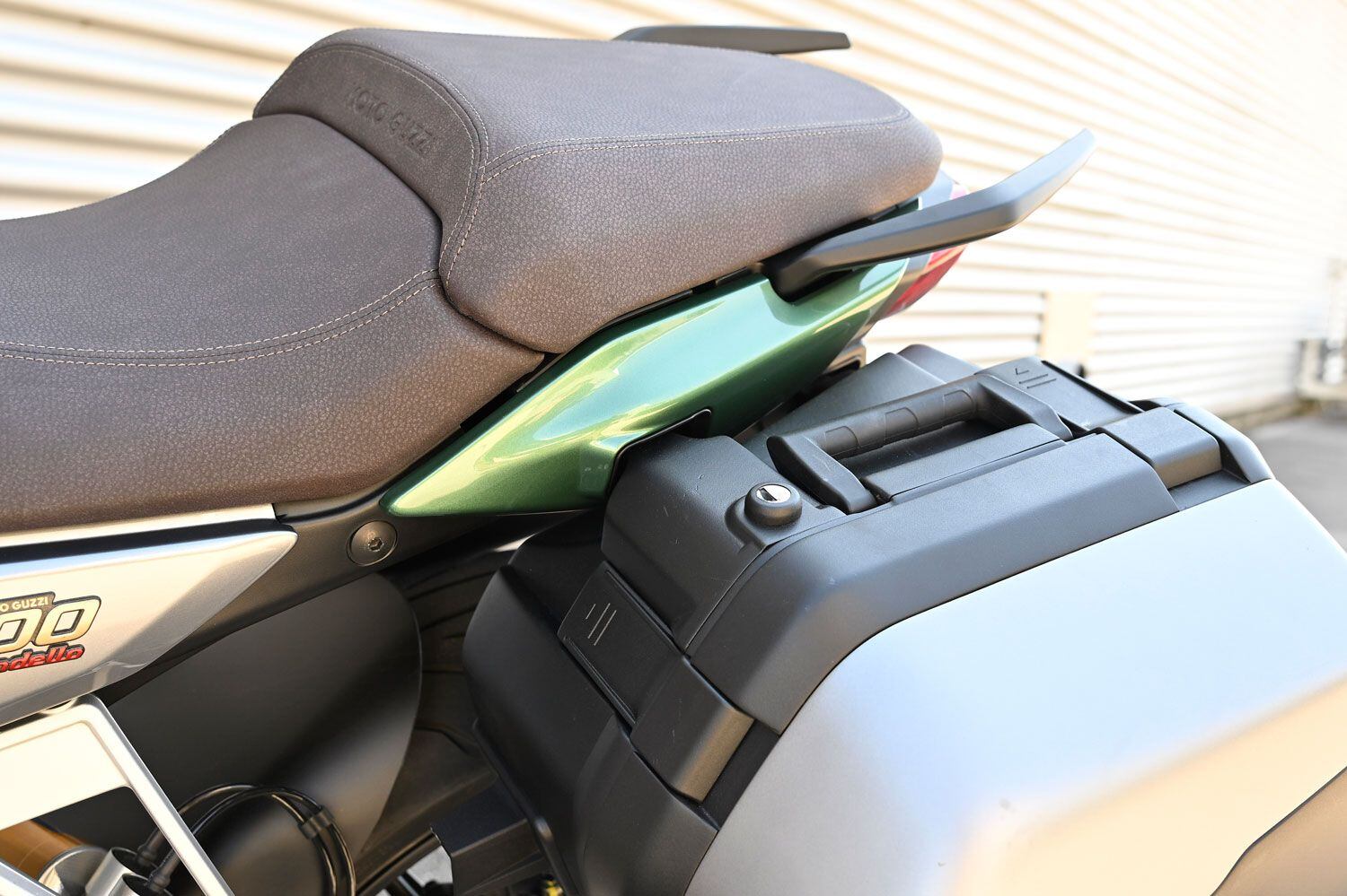 The V100’s seat was very comfortable on the daylong ride; the mechanism for attaching the optional saddlebags by unlocking the pillion seat, sliding the bag’s posts into their slots, and then clicking the seat back down to lock the bag is super slick.