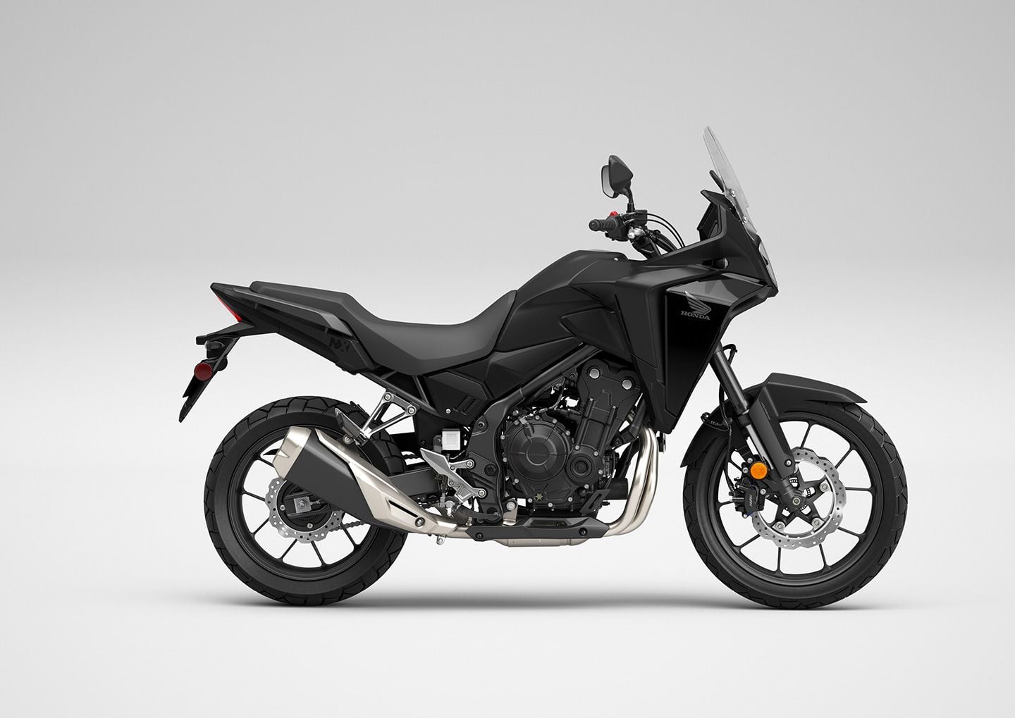 It packs the same 471cc parallel-twin engine and steel tube frame as the outgoing CB500X, but the 2024 NX500 also gets a new 5-inch TFT screen and traction control.