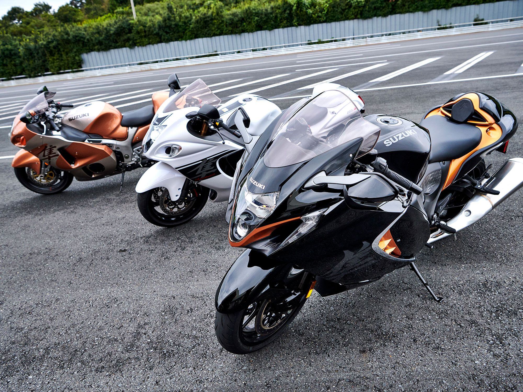 Three generations of Hayabusas. From the left: the 1999 model, the 2008 model, and the 2022 “double R.”
